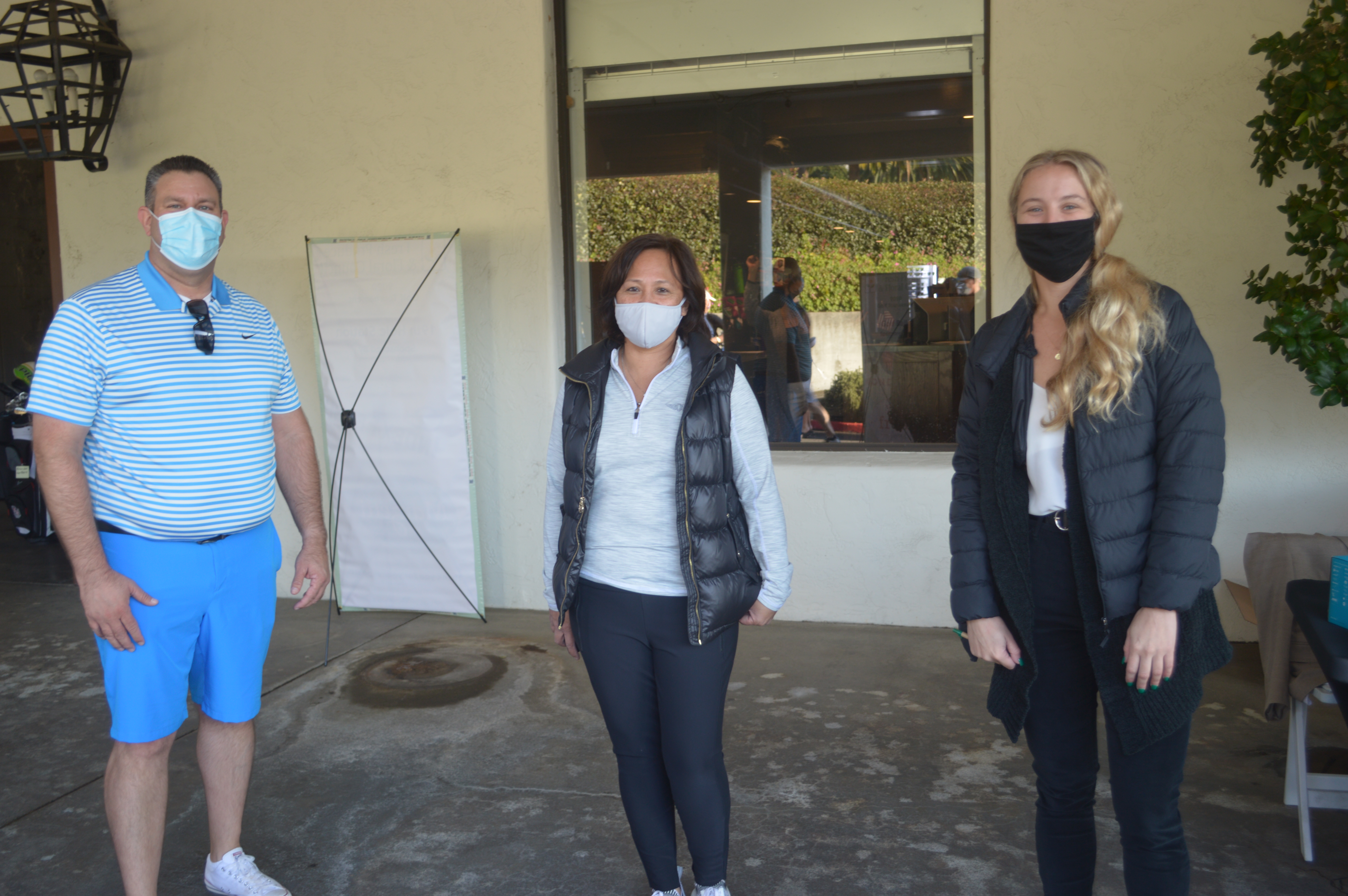 Brian Cook of Pete’s with Lynnie Nojadera of FreshSource and Emma McBride-Taylor of the FPFC .