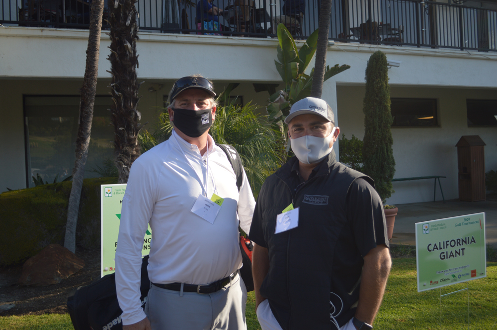 Jason Lathos of Church Brothers with Jesse Lopez of Ocean Mist Farms.