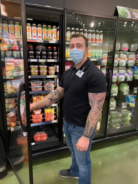 Brennan Belanger, Harps produce manager in West Fork, AR.