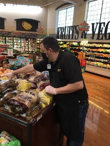 Kris Baxter, Harps produce manager in Rogers, AR.