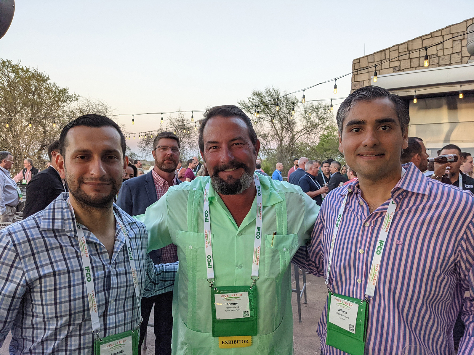 Tommy Hanka of Tommy Hanka Farms flanked by Armando Oyervides and Alfredo Montanaro of Frost Bank.