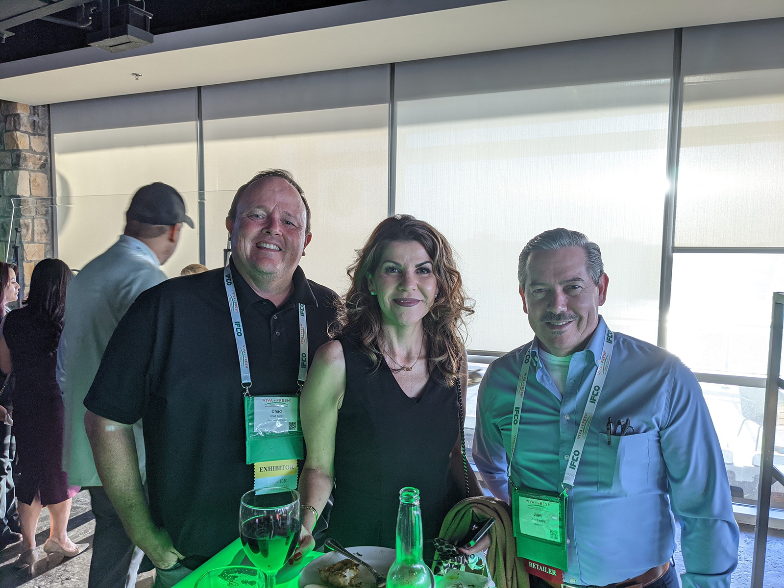 Chad Allred of Kingsburg Orchards with Paula Shimizu and Juan Estrella of Fiesta Mart.