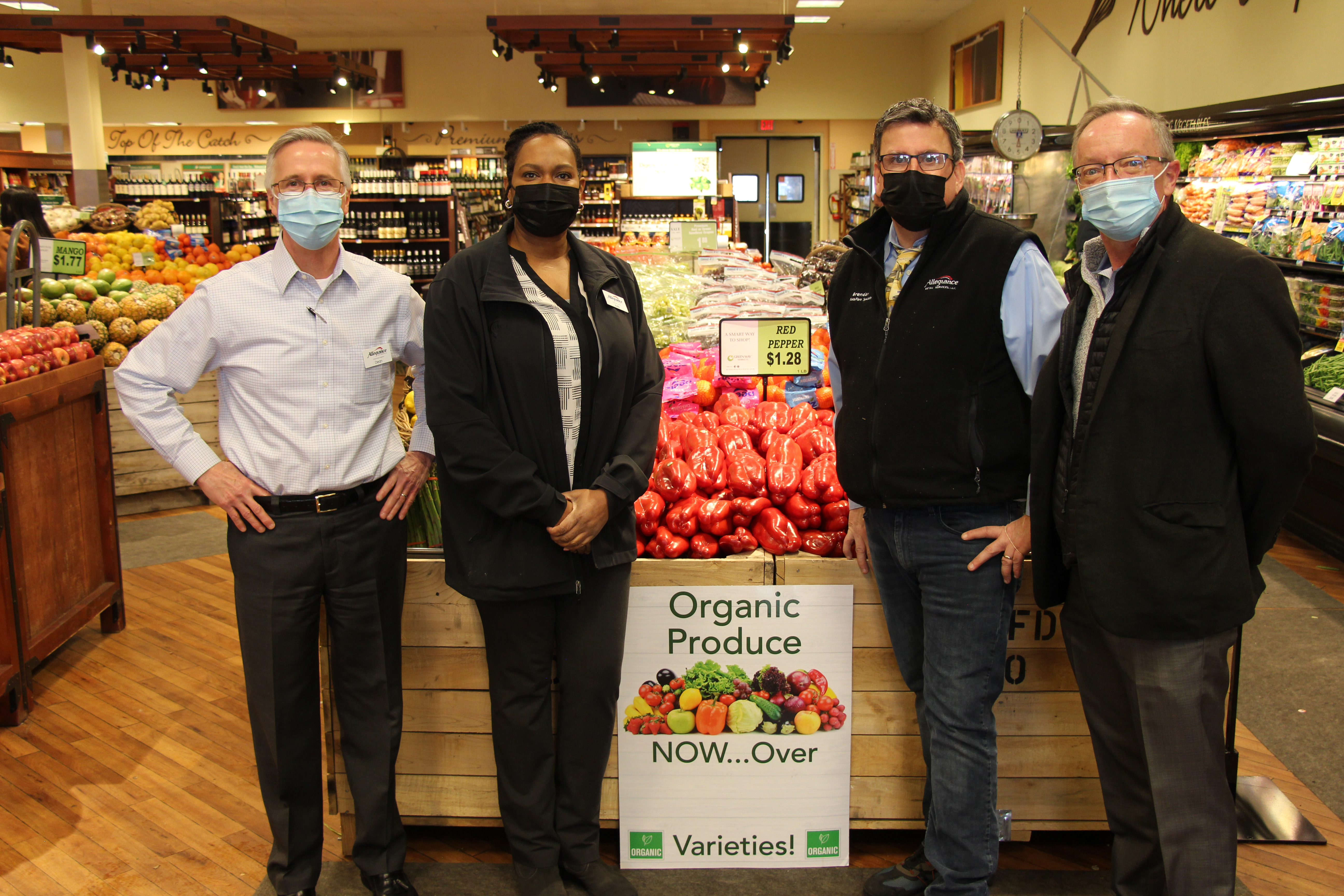 Dean Holmquist, vice president of store operations; Kelly Davis, director of produce and floral; Brendan Keating, produce and floral specialist; and Ken Brickel, general manager of store operations.