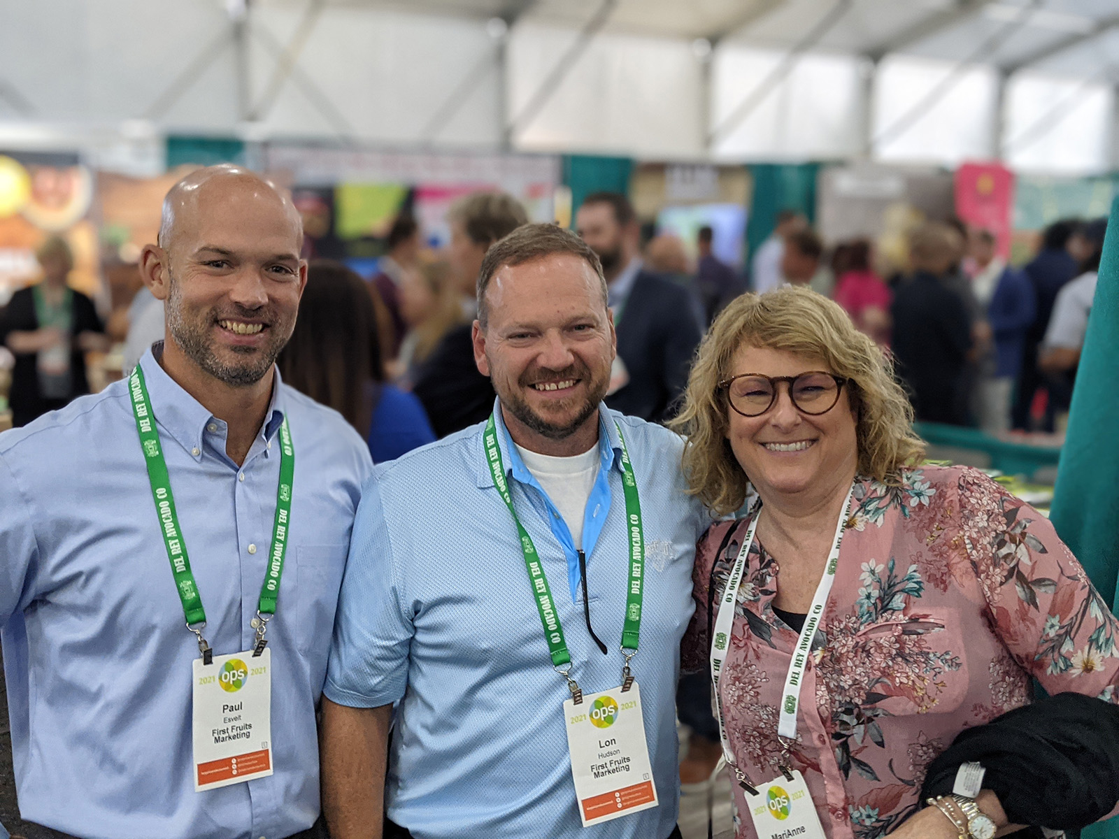Paul Esvelt and Lon Hudson of First Fruits Marketing with MariAnne Ridsdale of Sunrise Produce.