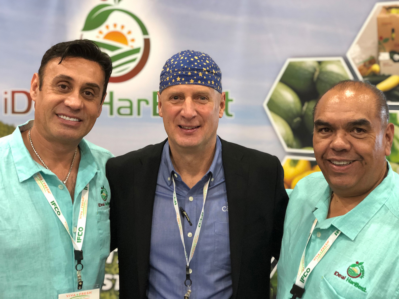 Ray Maragni (center) of Produce Connection with Hermy Torres and Manny Fajardo of iDeal HarBest.
