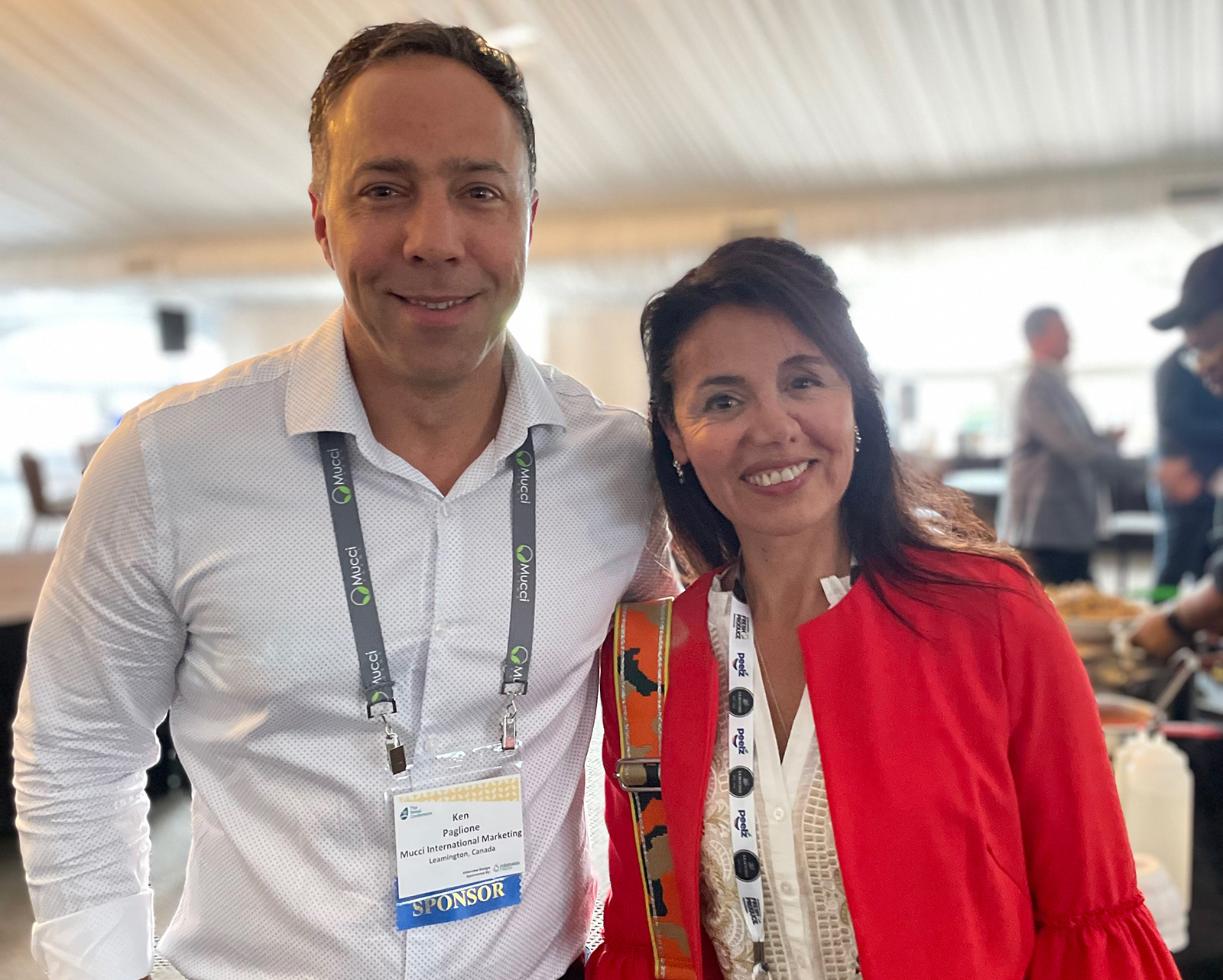 Ken Paglione of Mucci International Marketing with Cecilia Flores-Paez of T&G Global. 