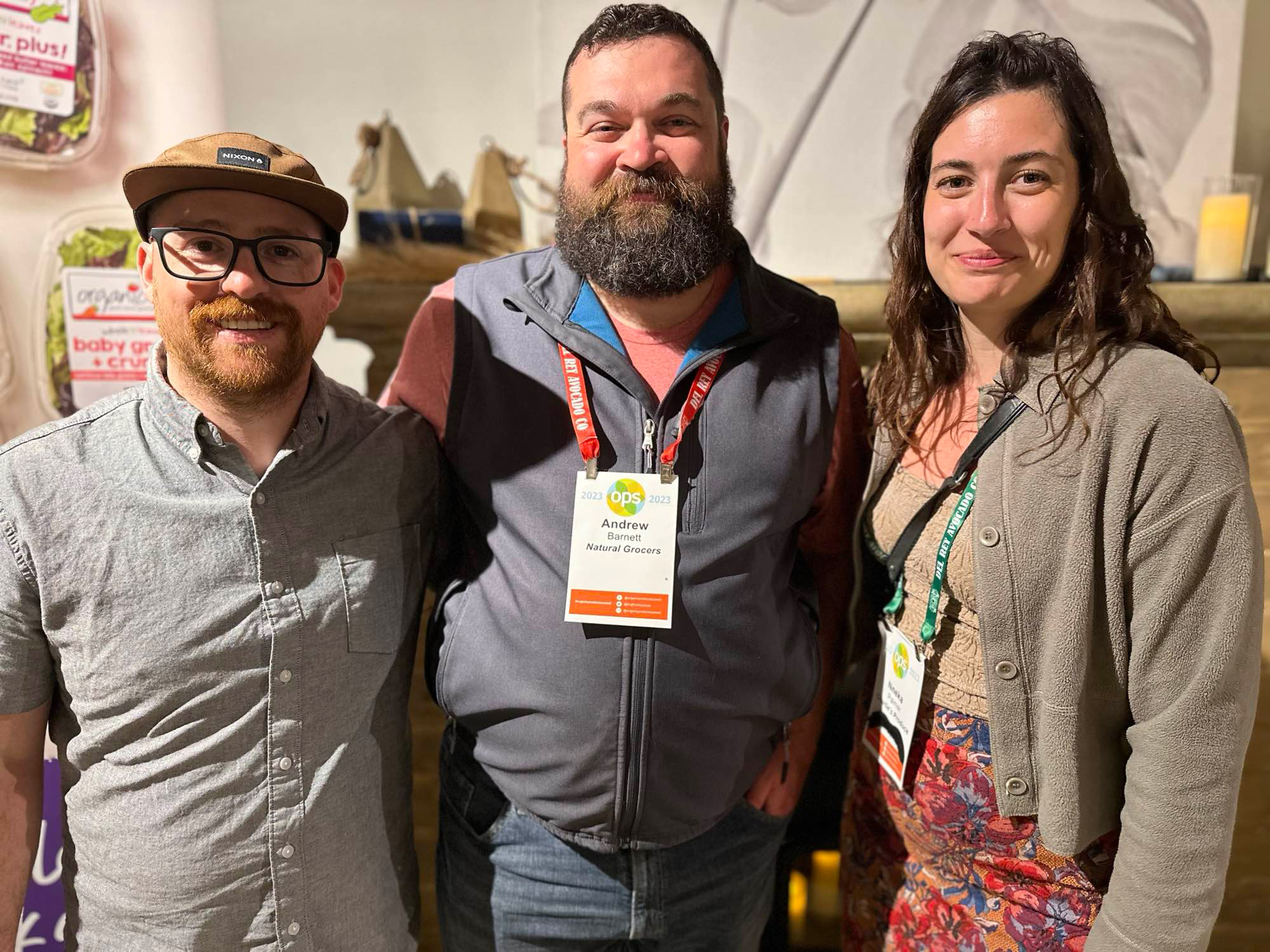 Matt Fowler and Andrew Barnett of Natural Grocers with Nneka Palmer of Charlie’s Produce.