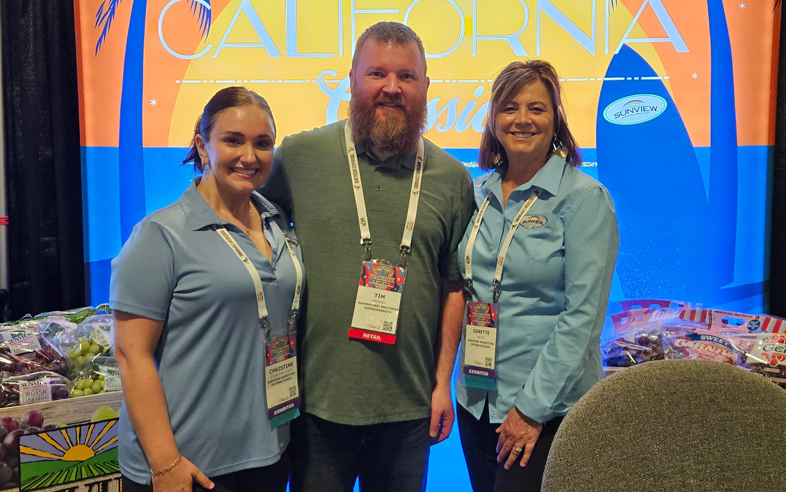 Tim Nadeau (center) of Hannaford Bros. Supermarkets flanked by Christine Etcheverry-Root and Ginette Brock of Sunview Marketing International.