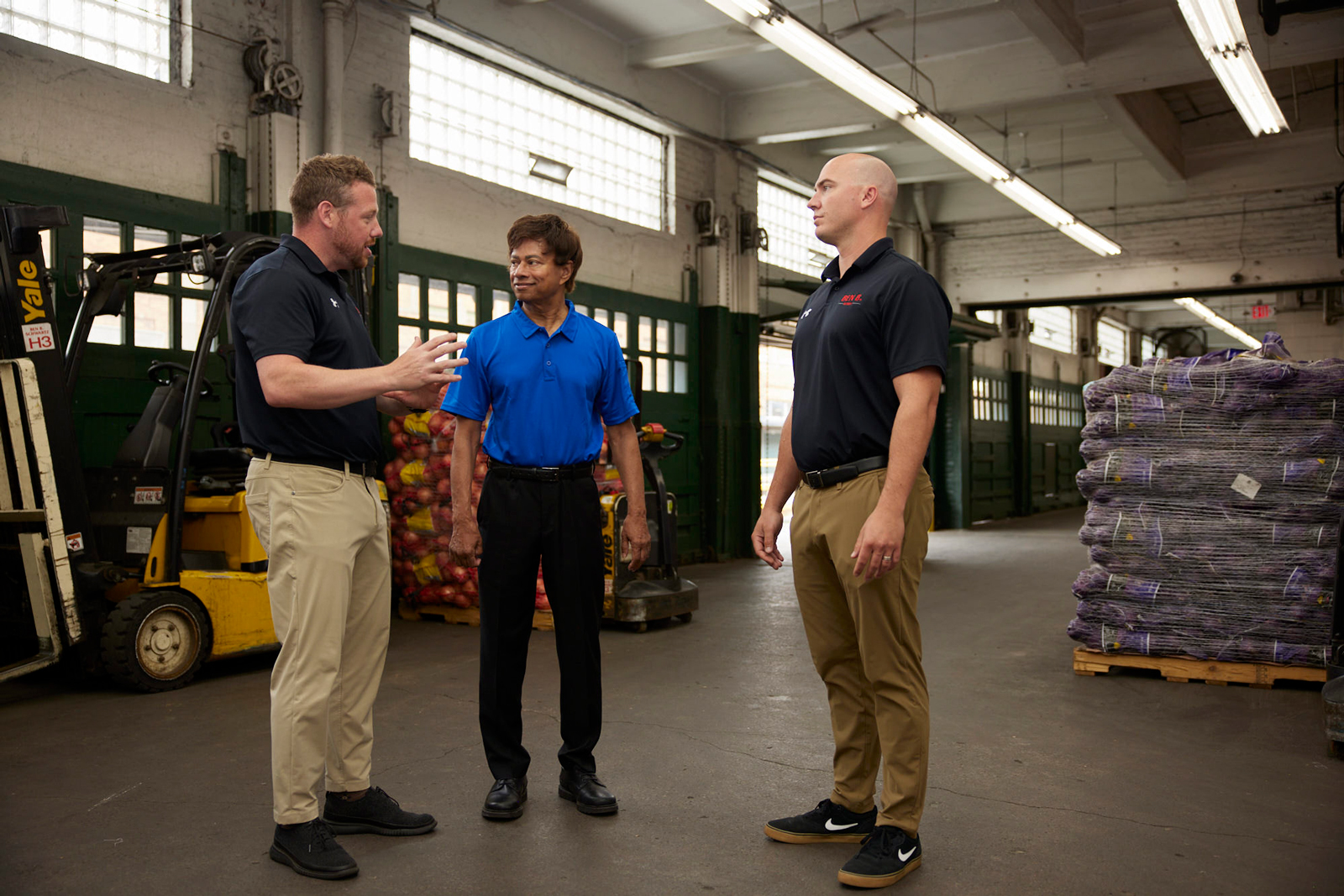 Congressman Shri Thanedar flanked by Bill Loupée and Jordan Grainger of Ben B Schwartz.