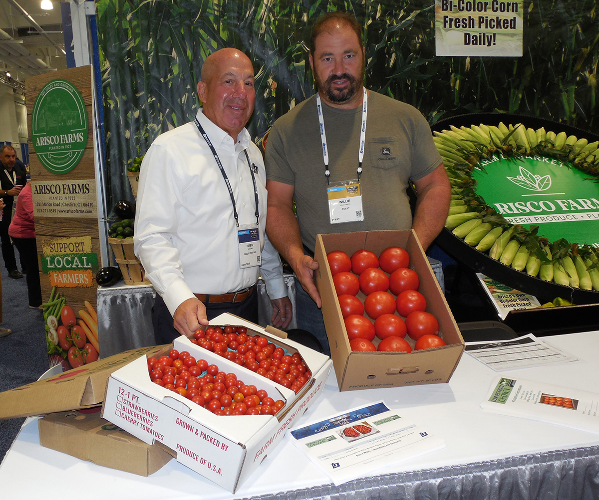 Greg Veneziano of Bozzuto’s Inc. with William Dellacamara of Cecarelli Harrison Hill Farm, which grows local vegetables in southern Connecticut for Bozzuto’s.