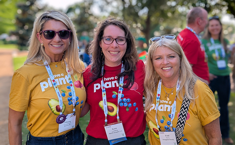 Tiffany Cruikshank of Onions 52 with Auna Lundberg of Stemilt Growers and Kristi Harris of Honeybear Brands.