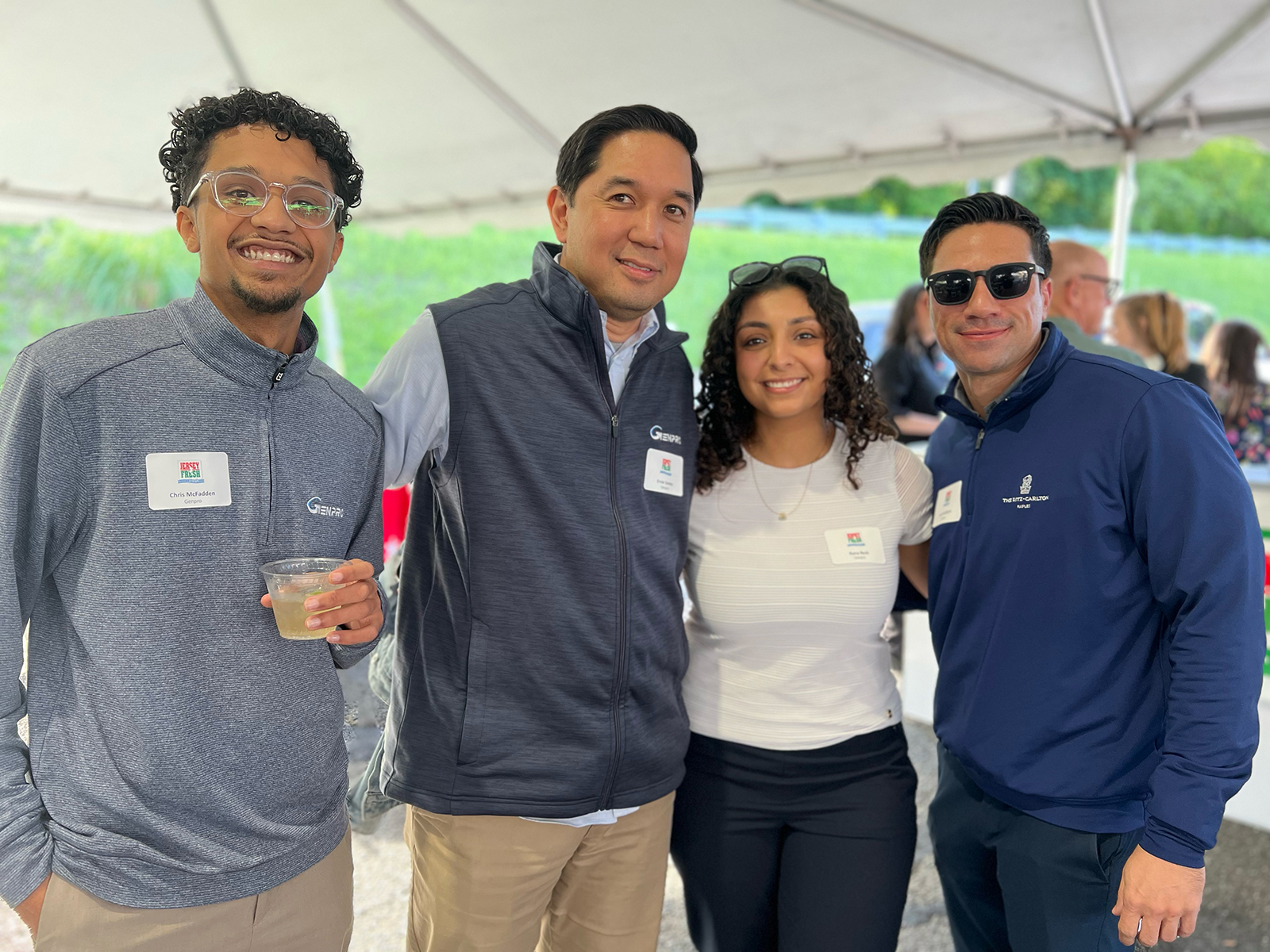 Chris McFadden, Ernie Santos, Rana Rezk and Chris Rodriguez of Genpro.