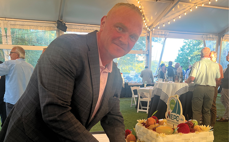 David Dearborn, vice president of produce at C&S Wholesale Grocers, who is president of the New England Produce Council, cut the cake to celebrate the organization’s 25th anniversary.