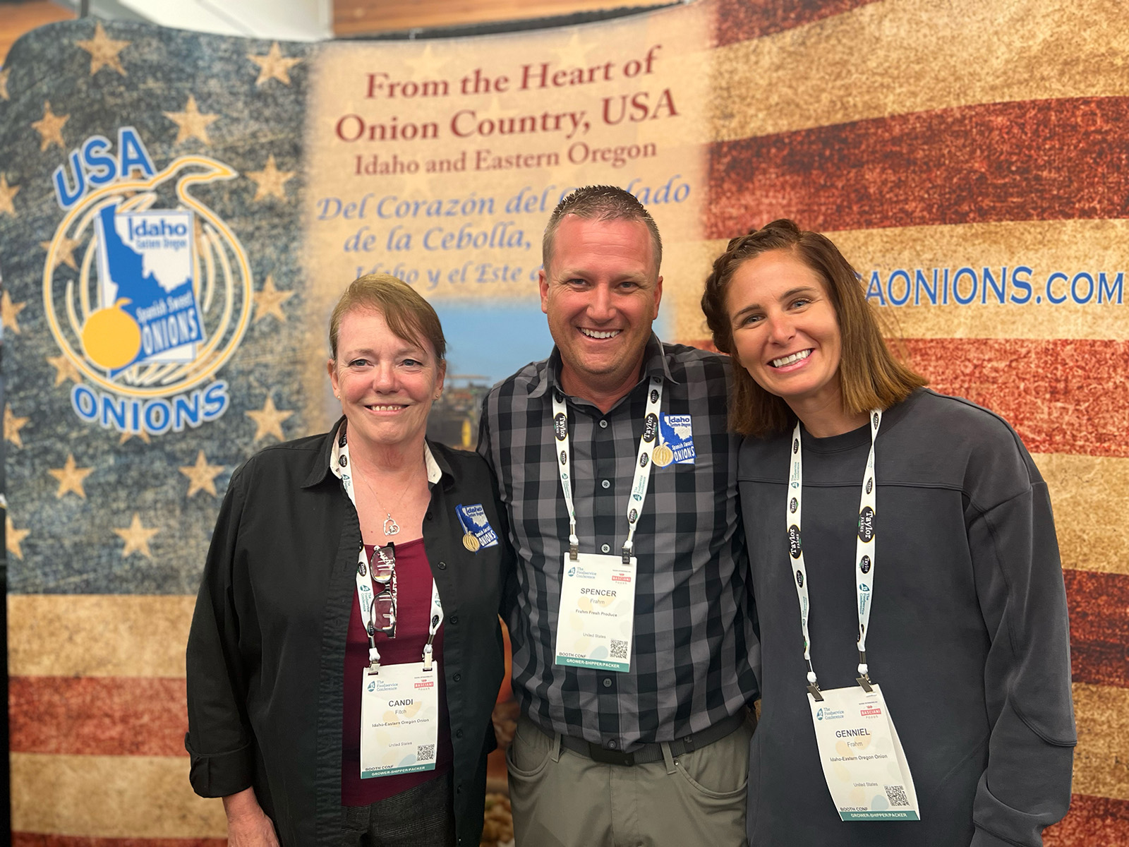 At the Idaho Eastern Oregon Onion Committee booth were Candi Fitch, and Spencer and Genniel Frahm of Frahm Fresh Produce.