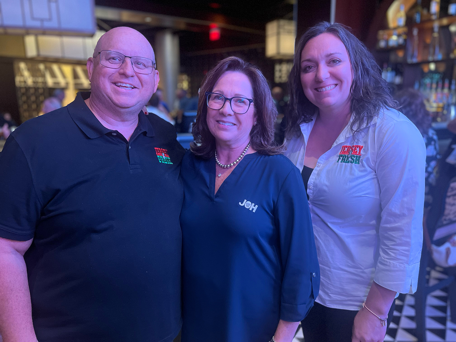 Theresa Lowden (center) of JOH with Joe Atchison and Christine Fries of the New Jersey Department of Agriculture.