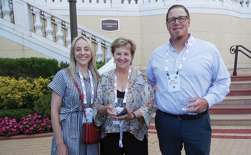 Mary Spry of U.S. Bank with Linda Spry and Matt Holt of Coast to Coast Produce.