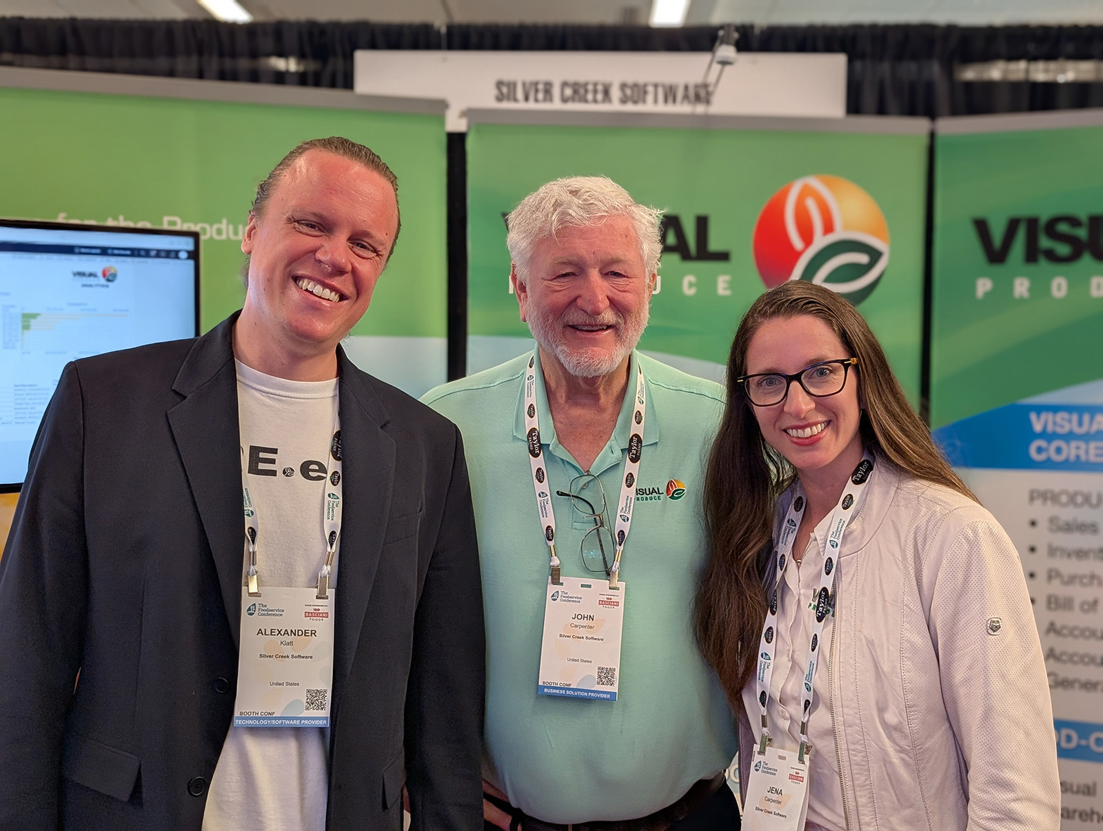 Alexander Klatt with John and Jenna Carpenter, all of Silver Creek Software.