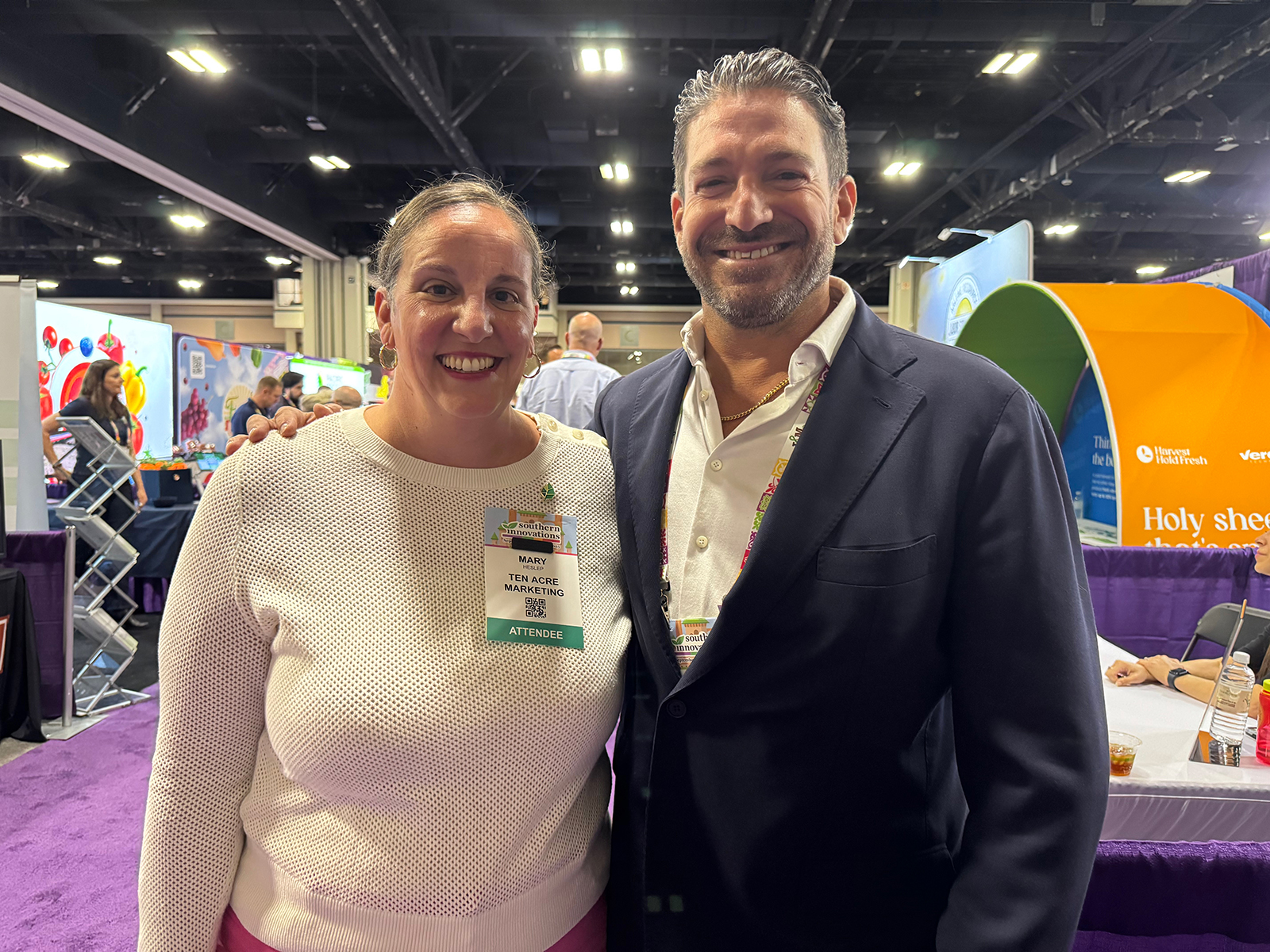 Mary Heslep of Ten Acre Marketing with Chris Gonzalez of WP Produce.