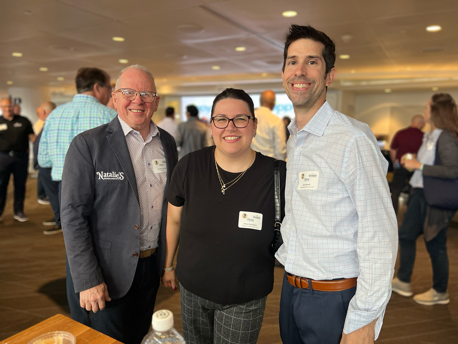 Michael Damato of Natalie’s with Alexa Conciatori and Gary Roselli of Allegiance Retail Services.