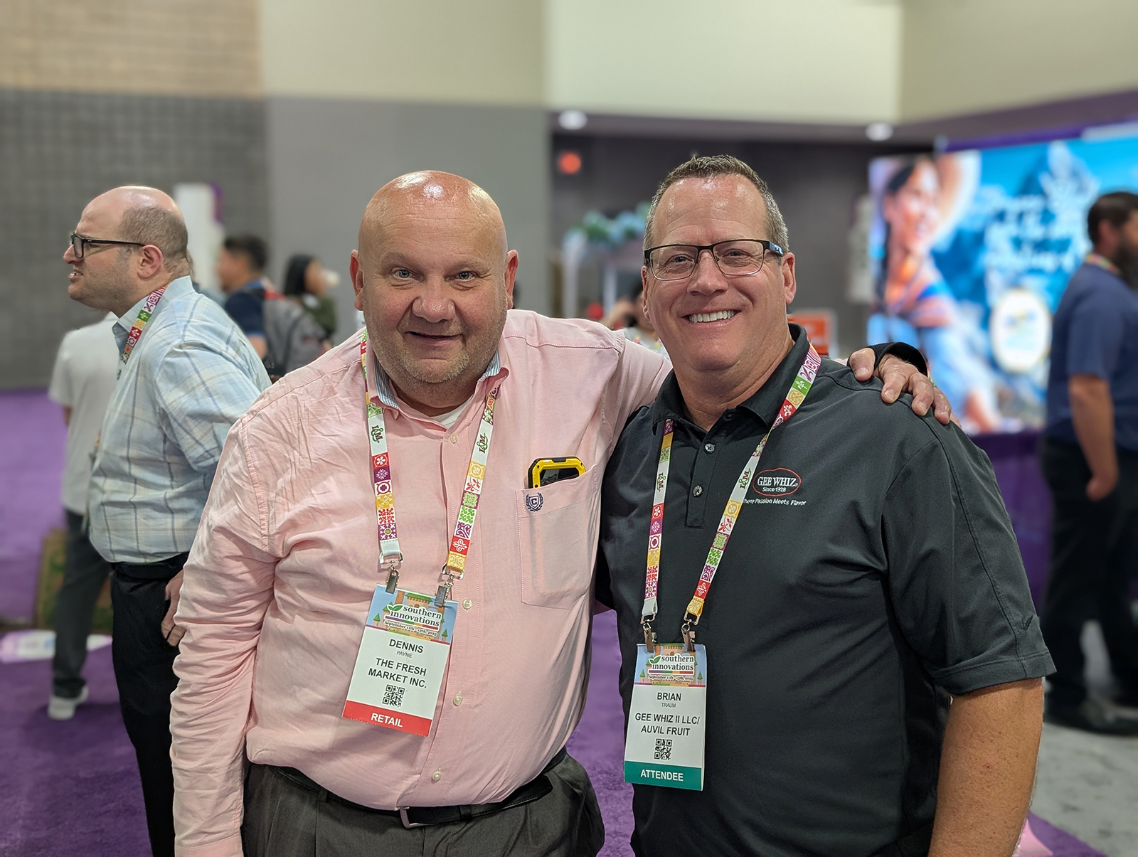 Dennis Payne of The Fresh Market and Brian Traum of Gee Whiz/Auvil Fruit.