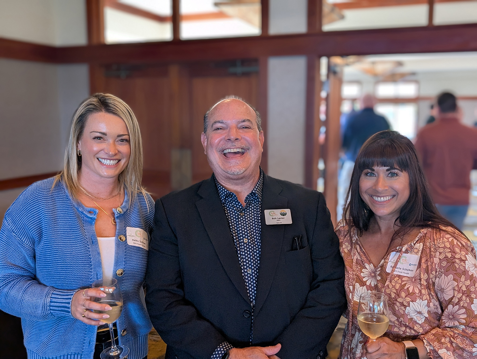 Kelby Sullivan of The On-Shelf Marketing Group with Bob Lanter of FPFC and Rachelle Schulken of F&S Fresh Foods.