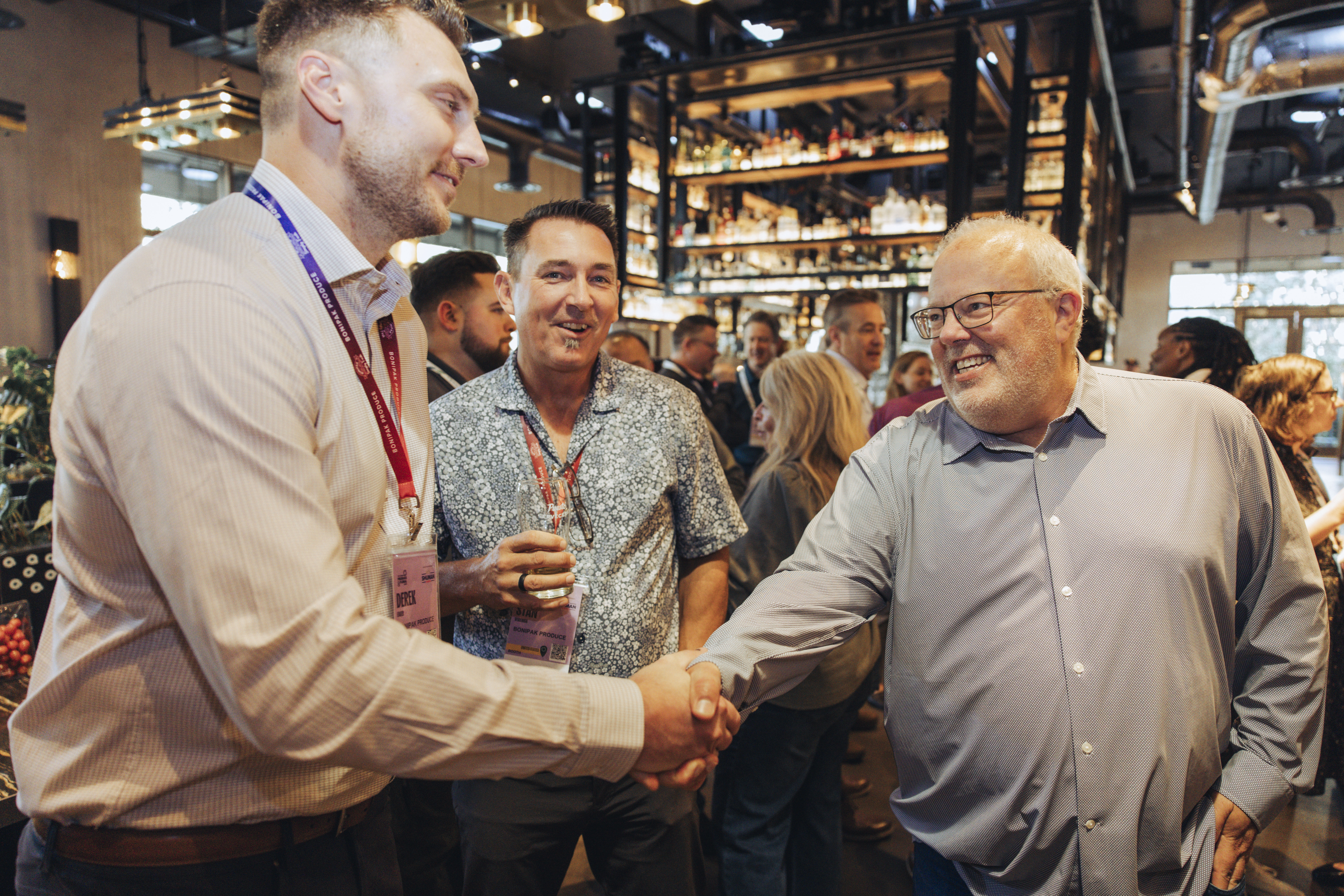 Derek Eager and Stan Otremba from Bonipak with Mark De Costa of Costco.