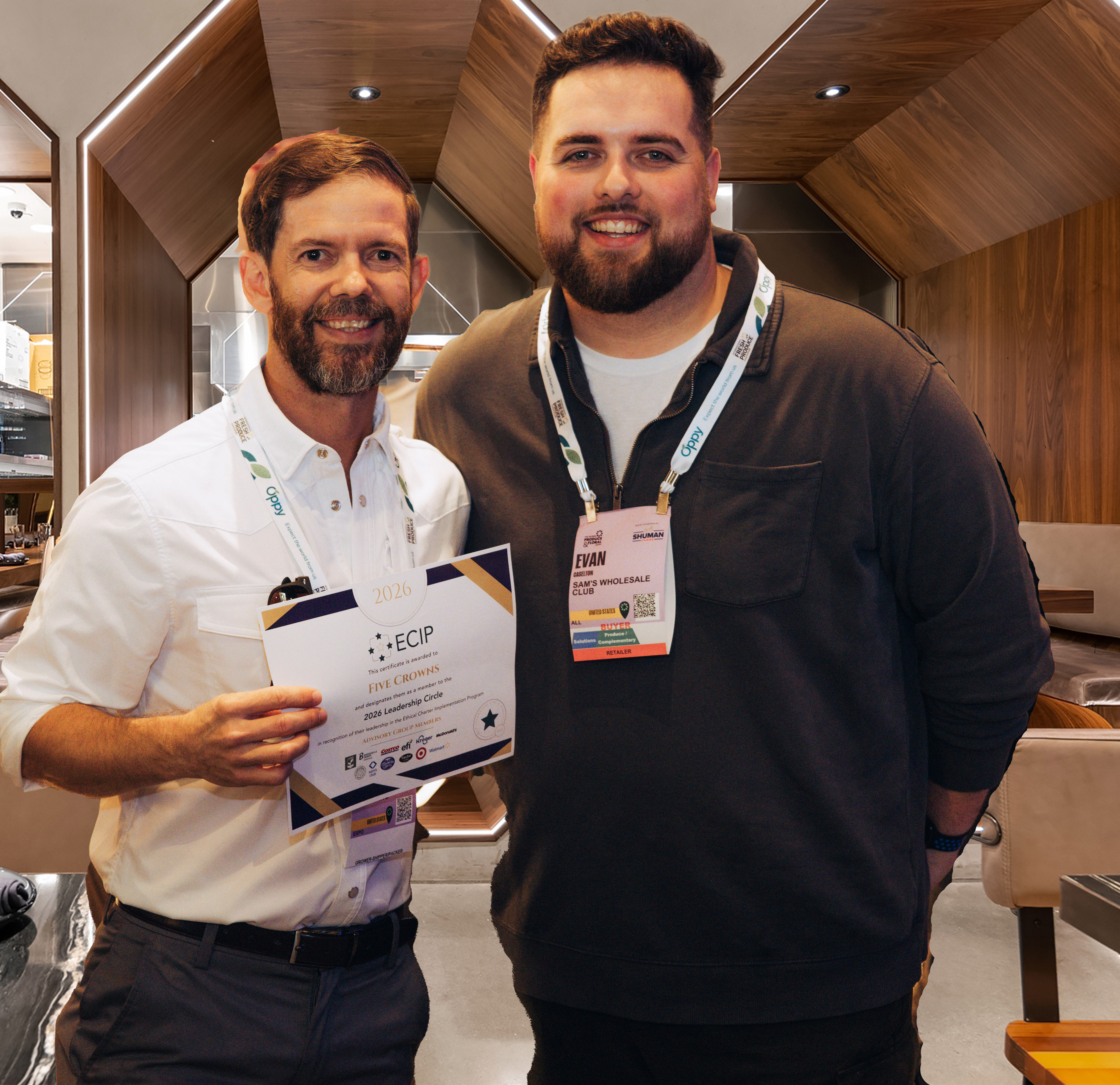 Cameron Tate of Five Crowns Marketing with Evan Caselton of Sam's Club.