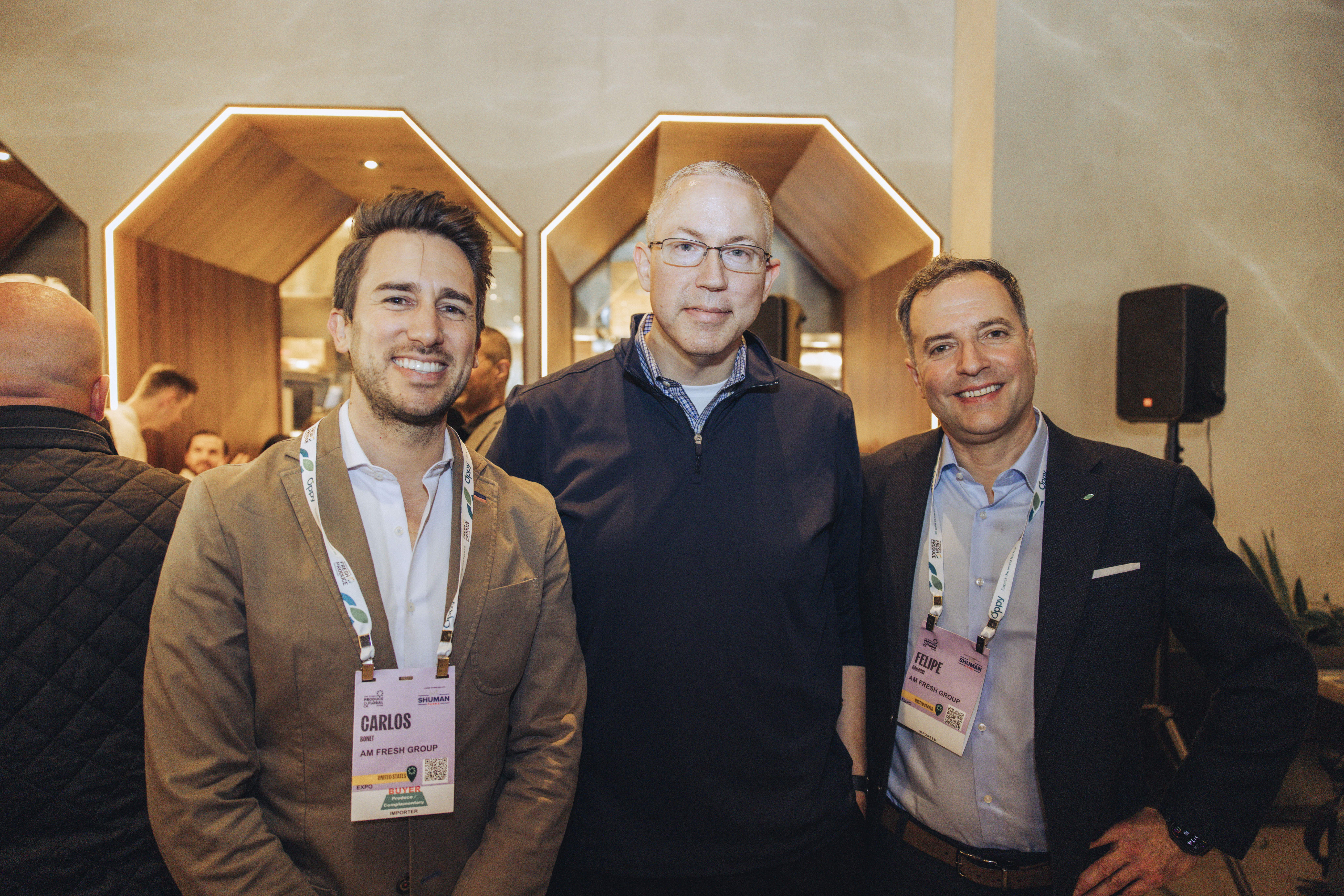 Bob Huskey of Costco flanked by Carlos Bonet and Felipe Canacri of AMFRESH.