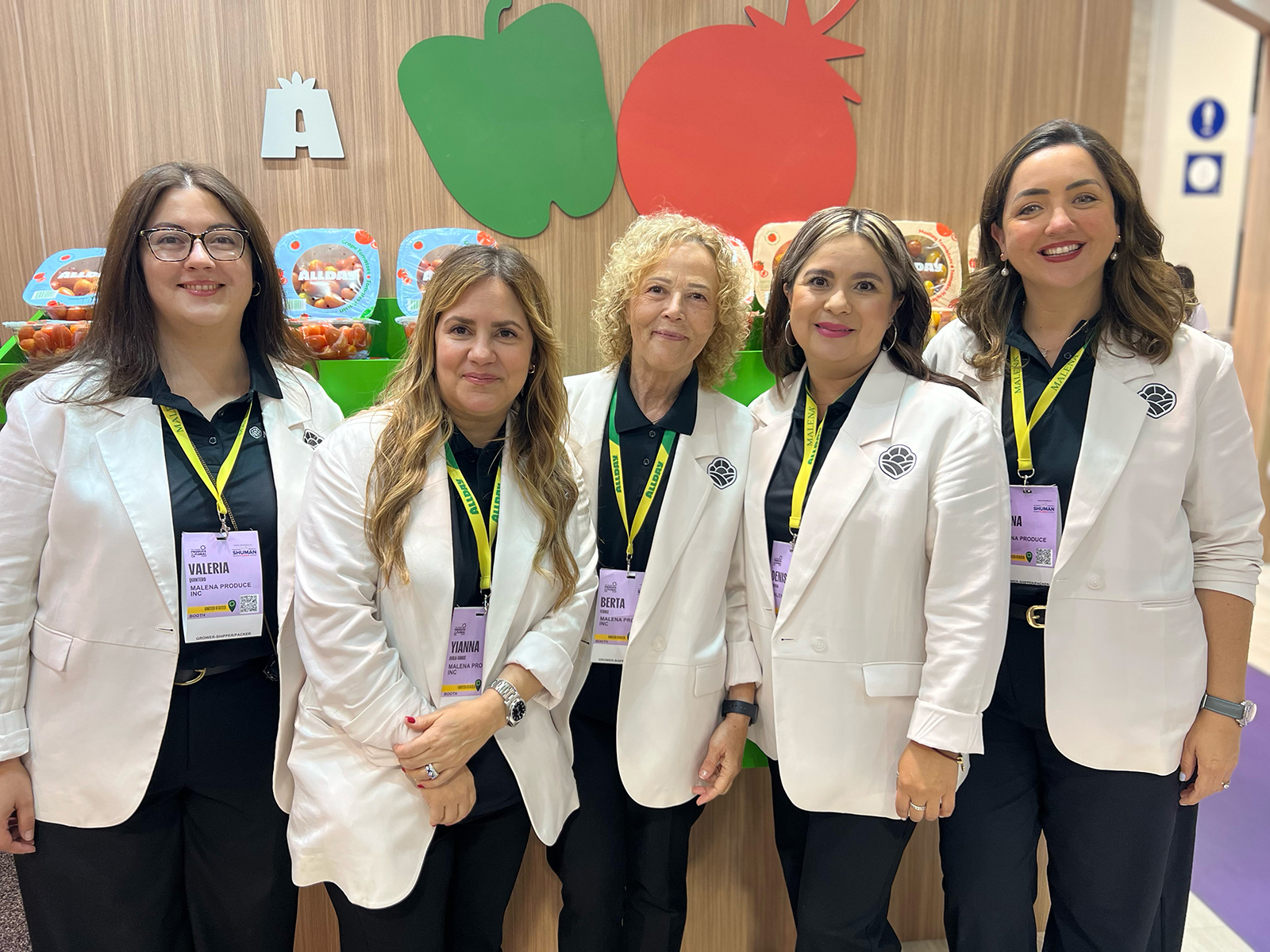 At the Malena Produce booth were Valeria Quintero, Yianna Avila, Berta Ferriz, Denise Quiroga and Alyna Cardenas.