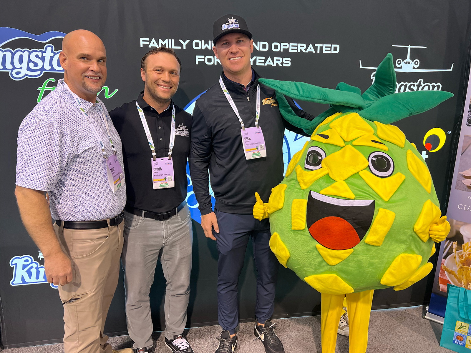 Mike Anderson, Chris Kingston and Nick Kingston of Kingston Fresh promoted their pineapple line with the help of their mascot.