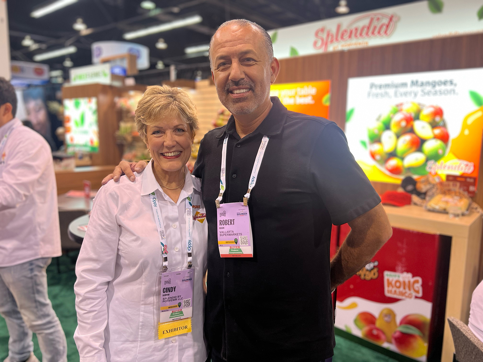 Robert Olguin of Vallarta Supermarkets stopped at the Splendid by Porvenir booth to visit with Cindy Schwing.