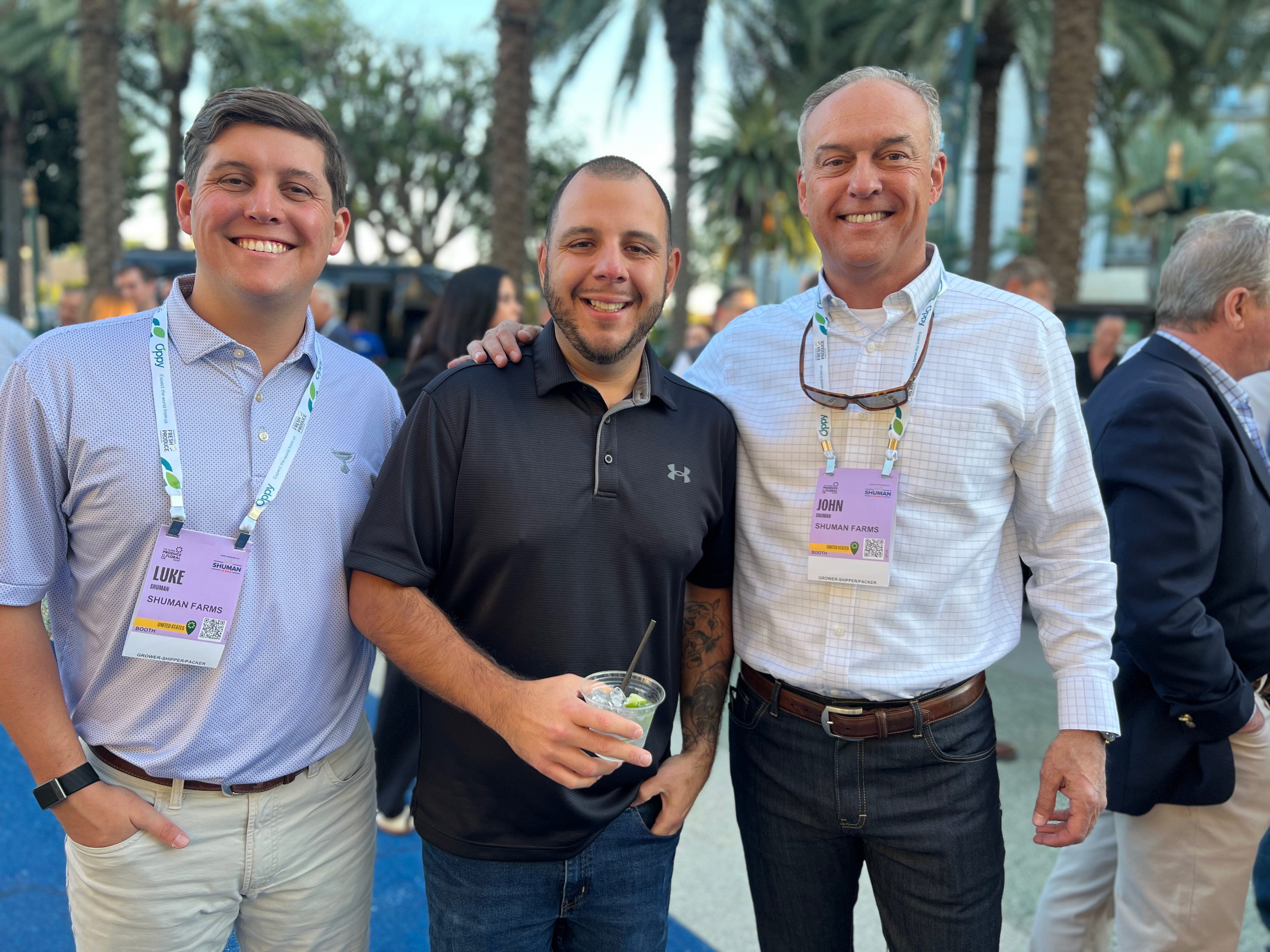 Joe Marinelli (center) of Stop & Shop with Luke and John Shuman of Shuman Farms.