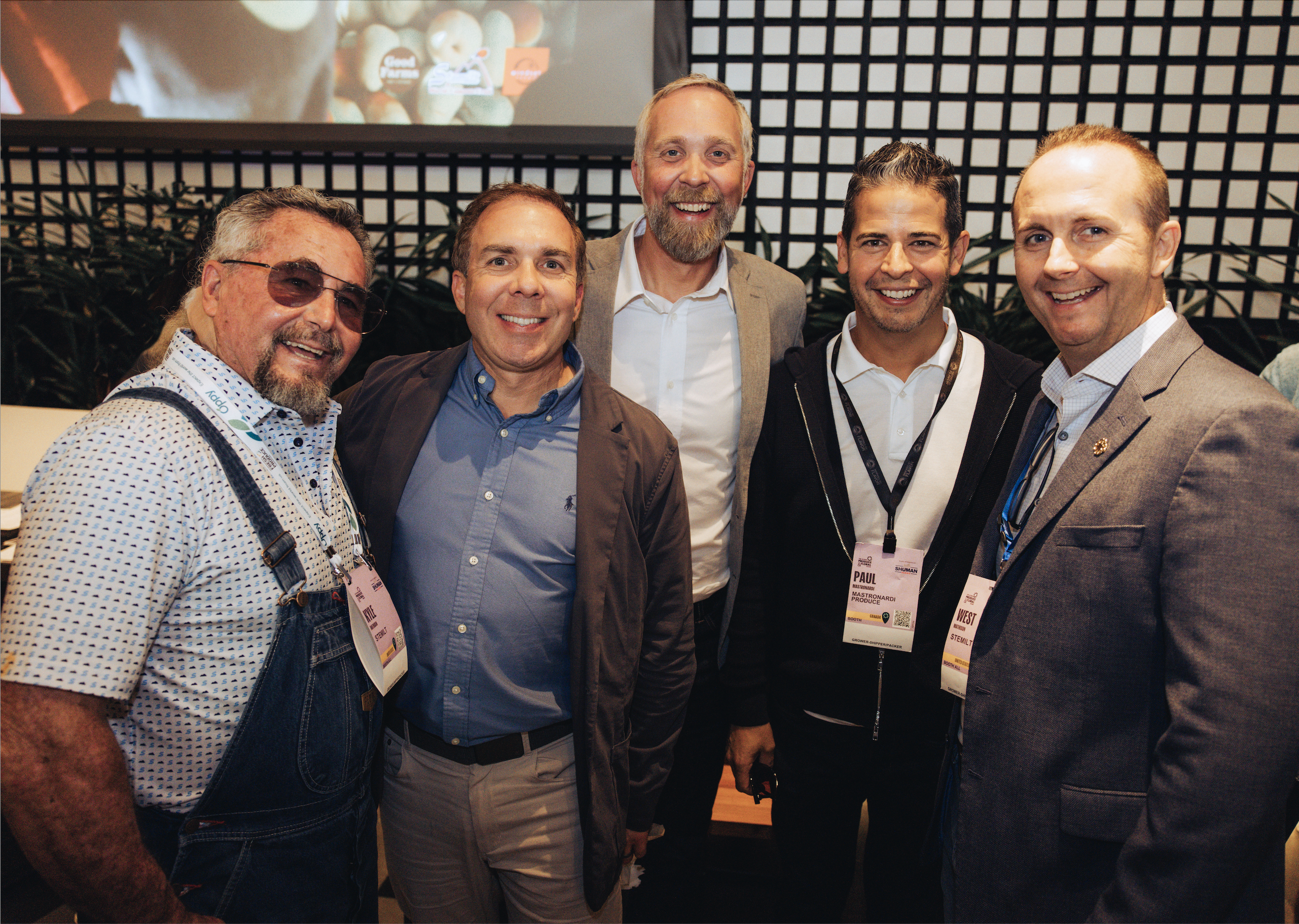 Kyle Mathison of Stemilt, Jim Hancock of Sam's Club, Mikel Hancock of Walmart, Paul Mastronardi of Sunset Grown and West Mathison of Stemilt.