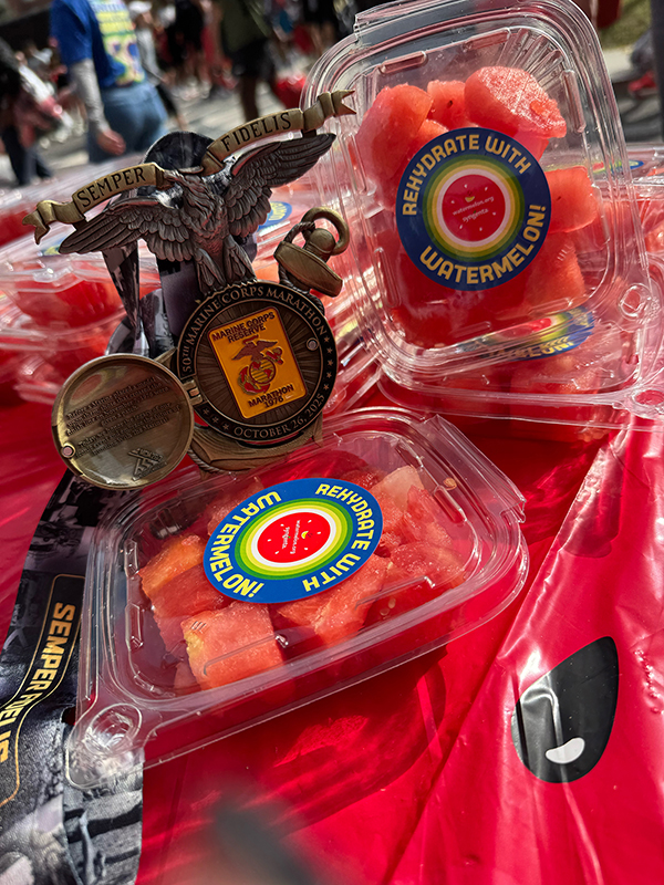 Watermelon with the MCM Finisher Medal.