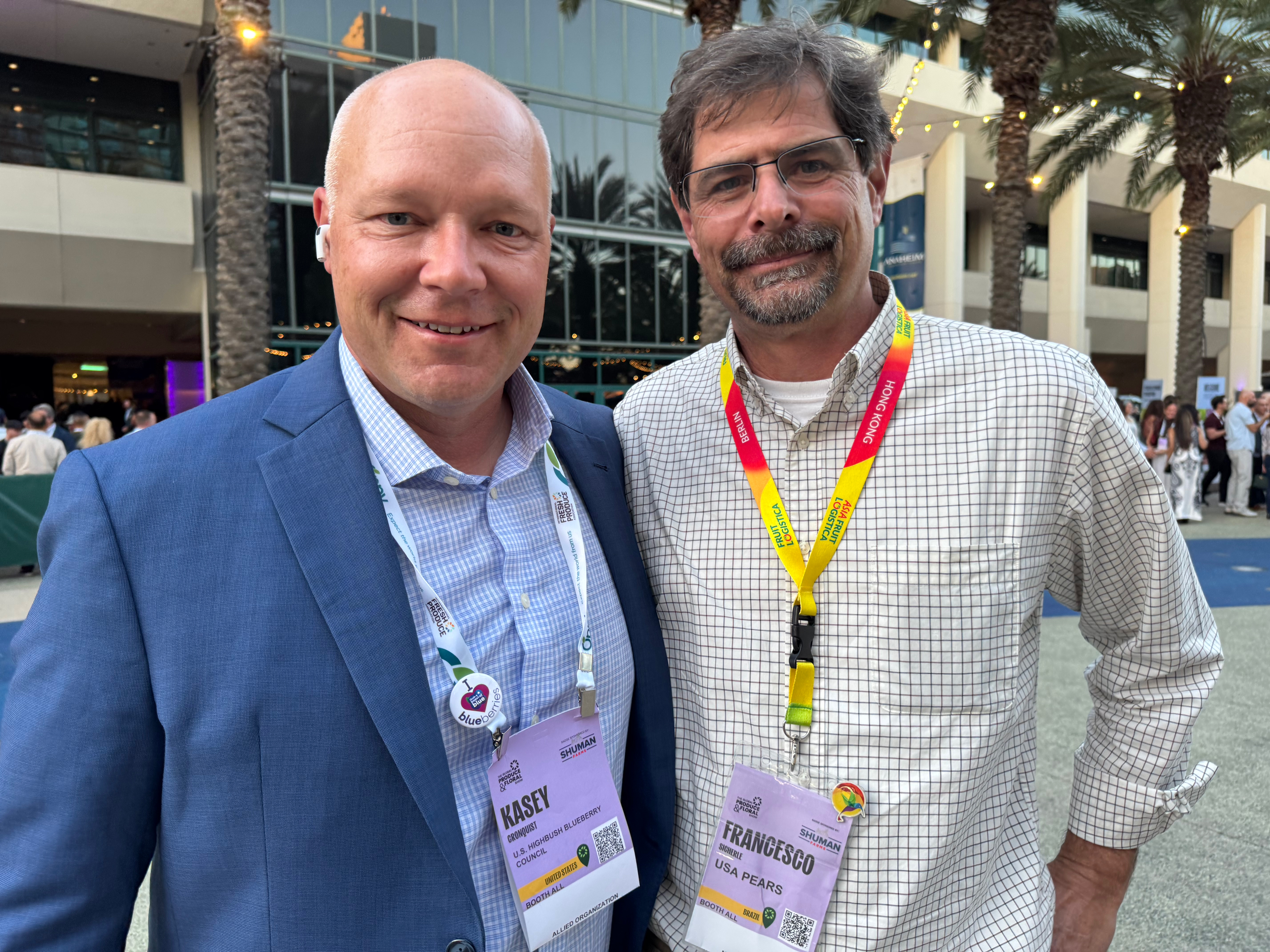 Kasey Cronquist of U.S. Highbush Blueberry Council with Francesco Sicherle of USA Pears.
