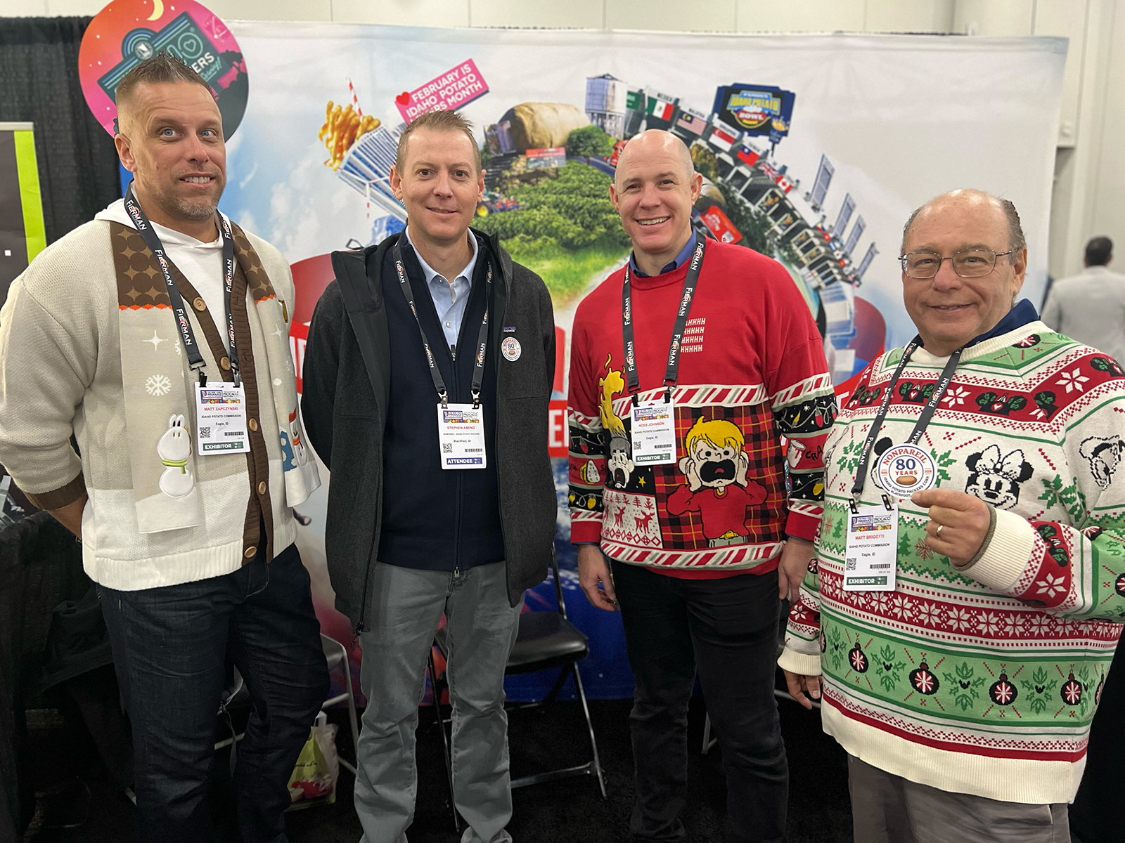 Stephen Abend (second from left) of Nonpareil/Idaho Potato Packers stopped at the Idaho Potato Commission booth to visit with Matt Zapczynski, Ross Johnson and Matt Brigotti.