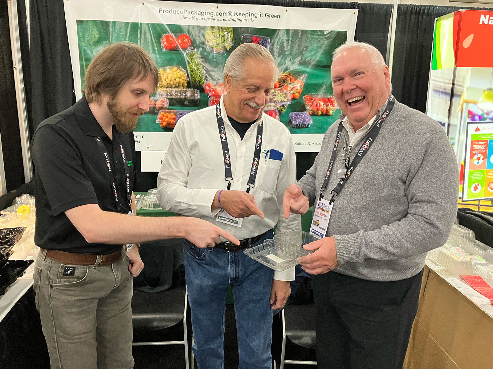Chris Zuhlke and Kurt Zuhlke of Kurt Zuhlke & Associates with Al Murray of the Eastern Produce Council. 