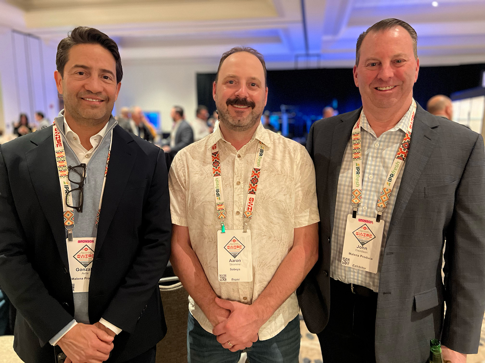 Aaron Stromme (center) of Sobey’s with Gonzalo Avila and John Davidson of Malena Produce.