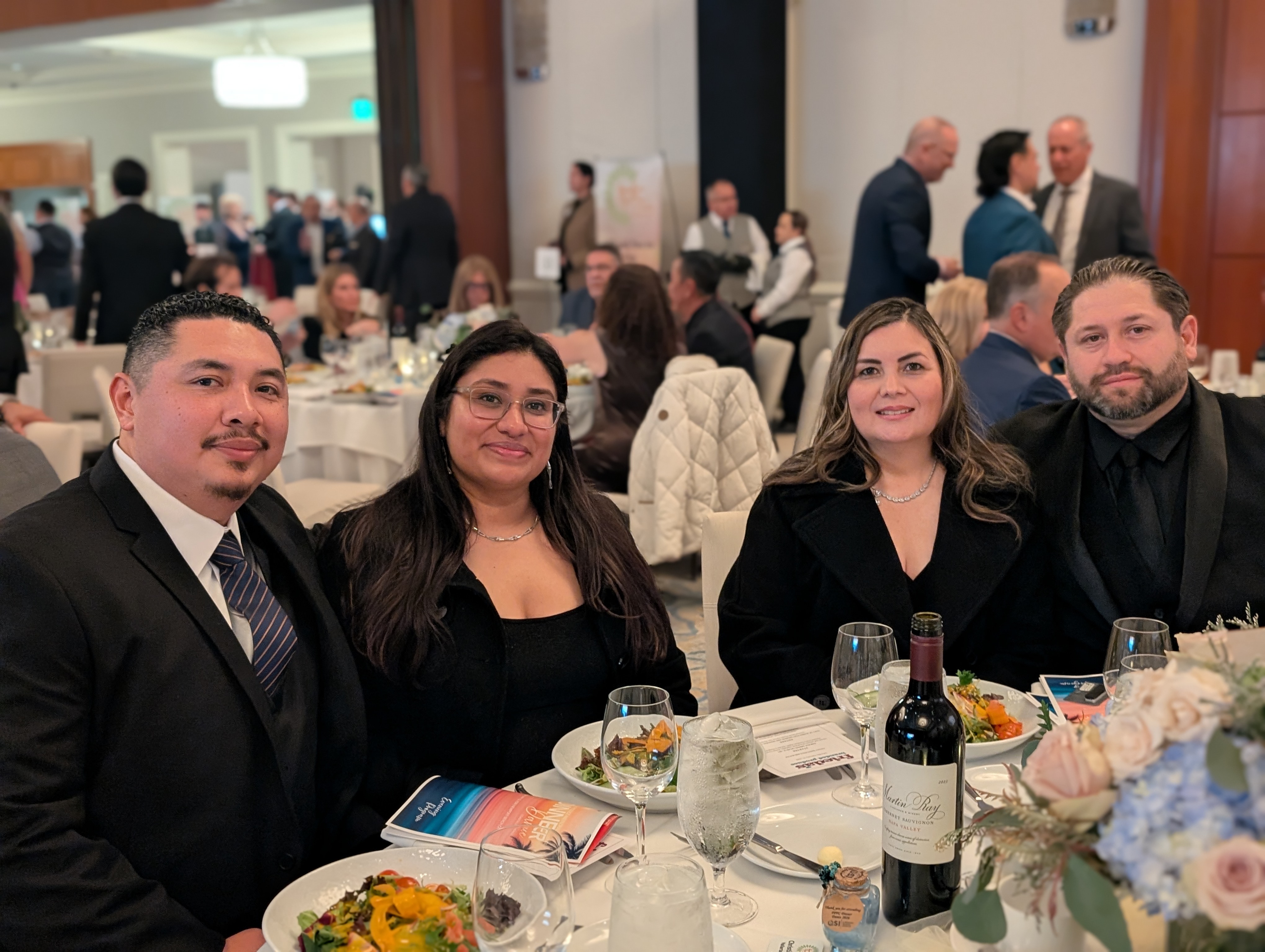Christian and Mrs. Gongzales and Ana and Mr. Torres of Vallarta Supermarkets.