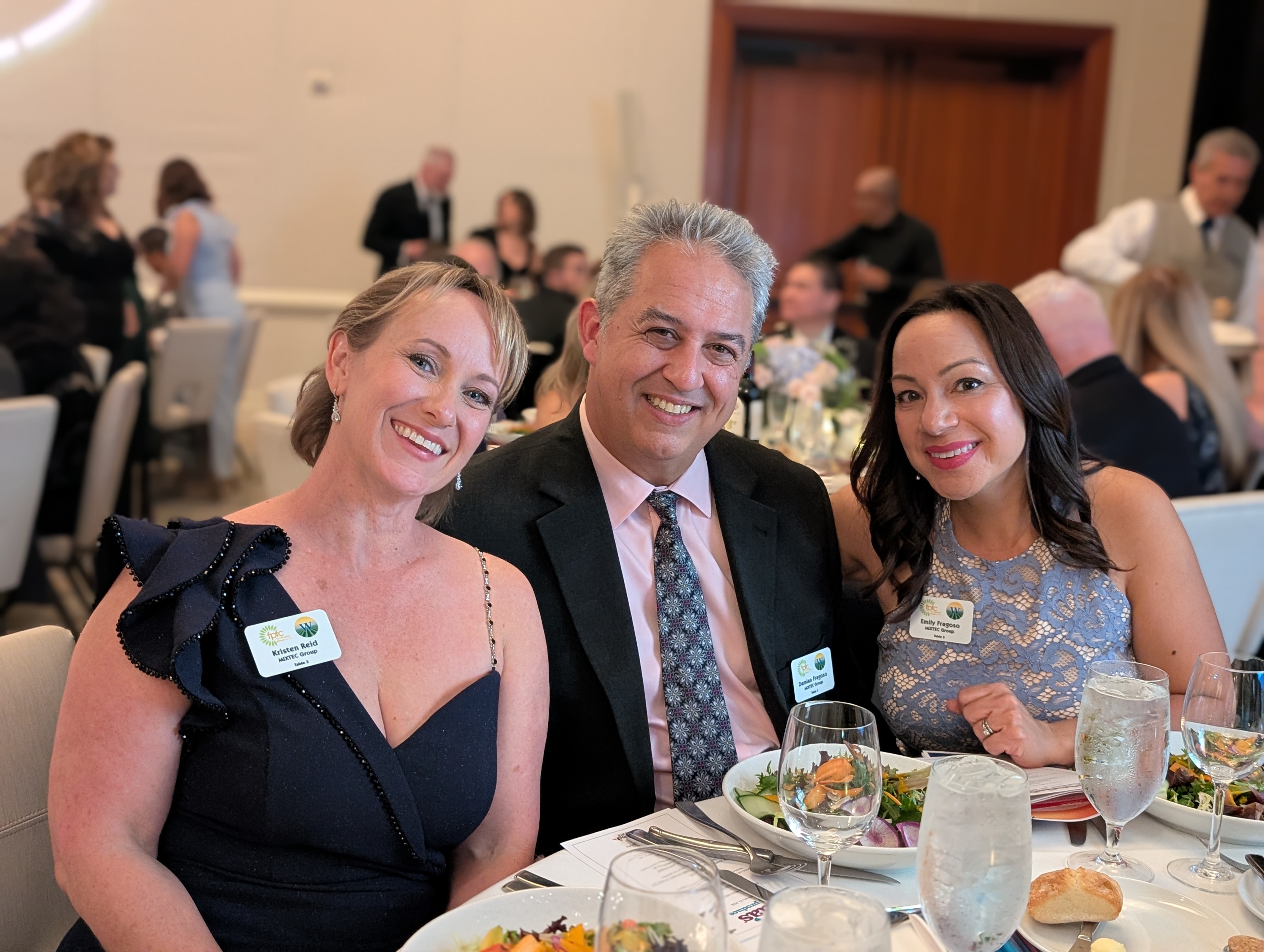 Kristen Ried with Damian and Emily Fragoso of Mixtec Group.
