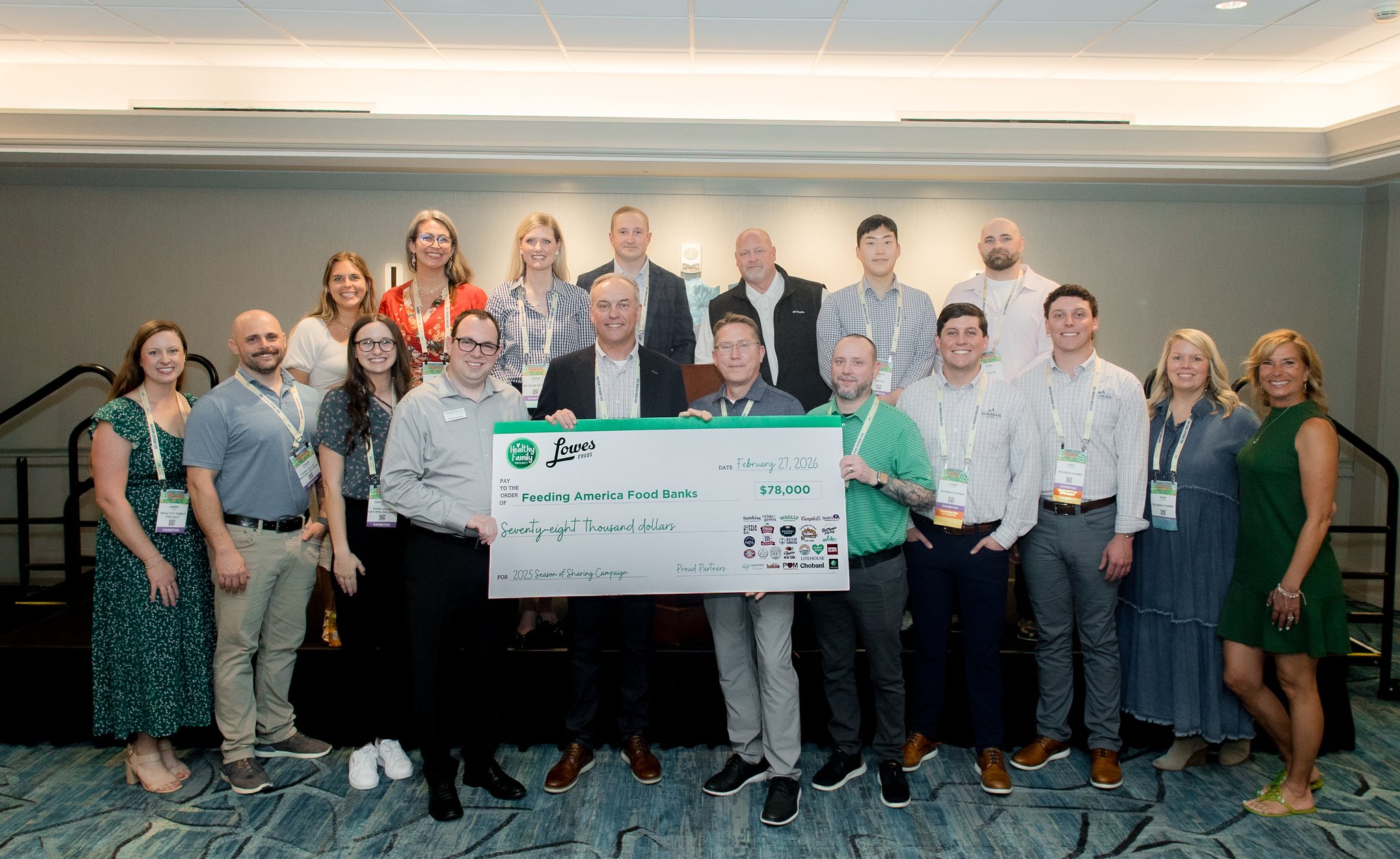 Lowes Foods Campaign check presentation, benefitting Feeding America.