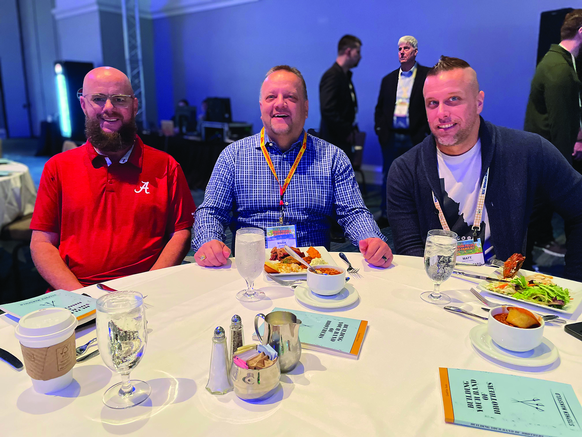 Geoff Brunette of Indianapolis Fruit Co. with Mark Daniels and Matt Zapczynski of Idaho Potato Commission.