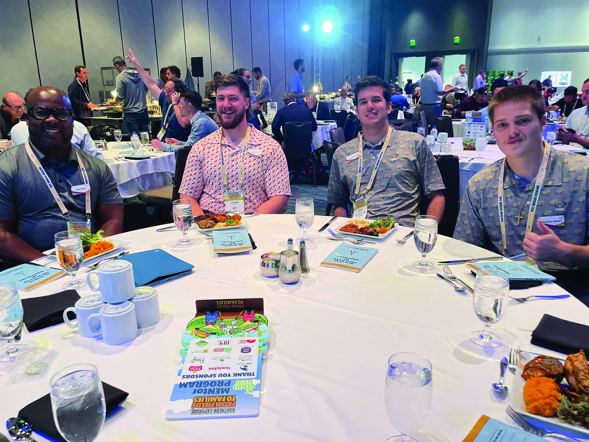 Gary Baker and Jordan Pregi of Merchants Distributors, Andy Brantmeyer of the University of Florida and Benjamin Walters of Virgina Tech.