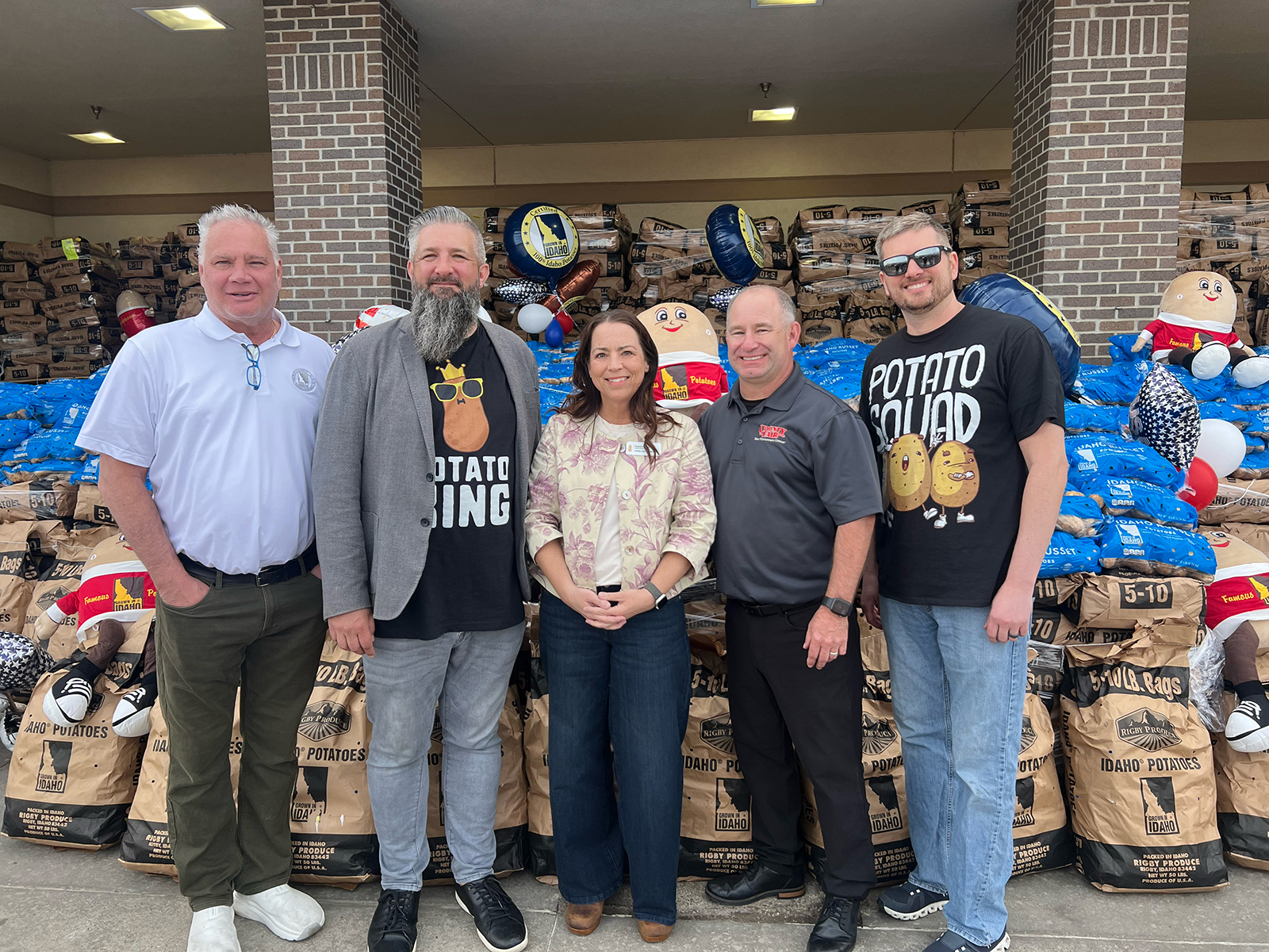 Patrick Mills of the IPC, Matt Roy of AWG, Susanne Gale of Feeding South Dakota, and Justin Luther and Steve Clarke, owners of County Fair.