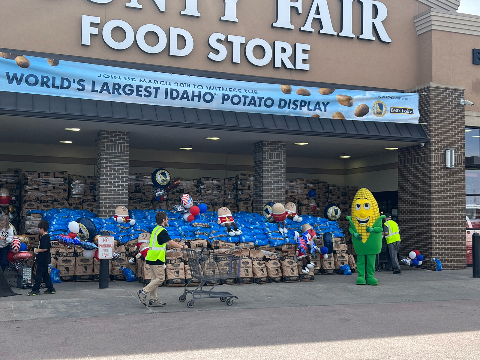 ‘Cornelius,’ the official mascot of Mitchell, SD, helped bring attention to the World’s Largest Potato Display at the County Fair location.