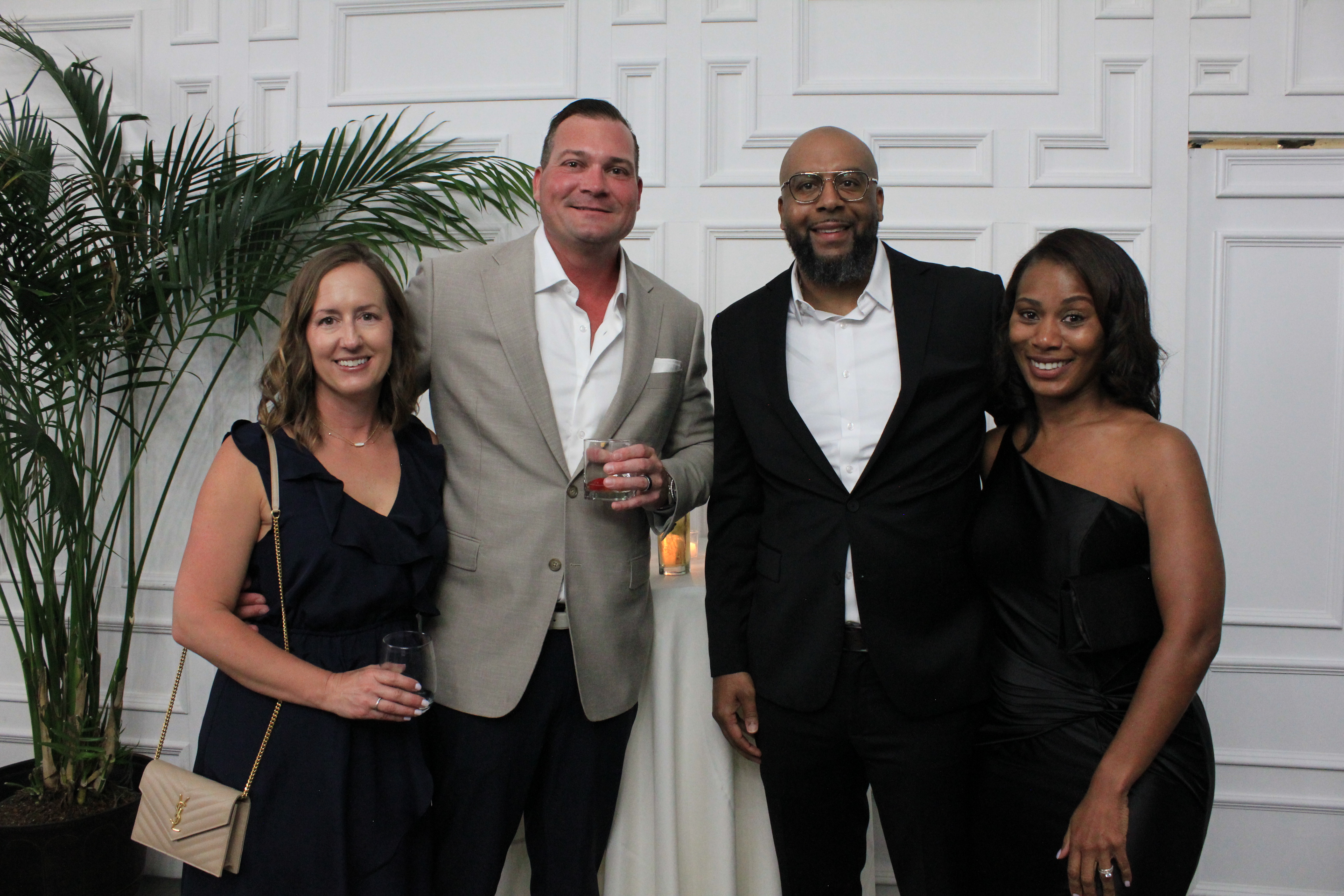 Kim and Dylan Dembeck of Minkus Family Farms with David and Iesha Jenkins of 68 Produce. 