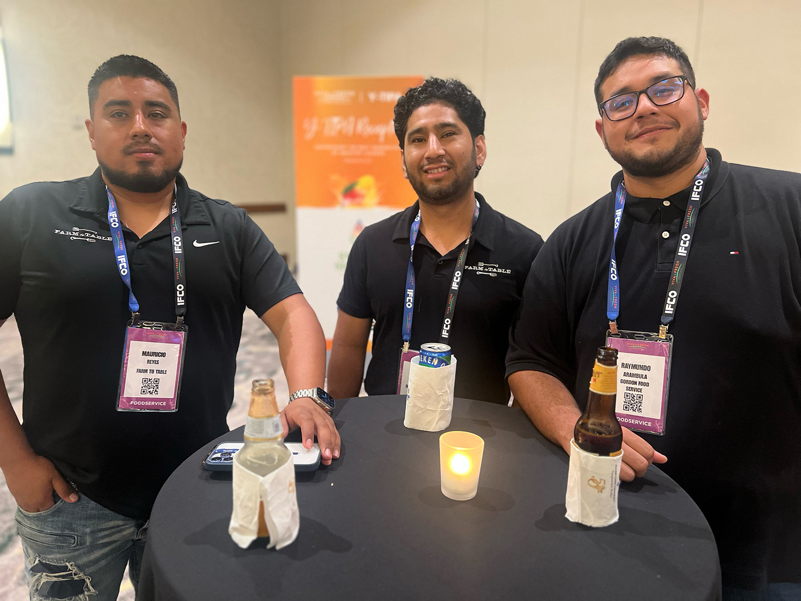 Mauricio Reyes and Alvaro Ochoa of Farm to Table with Raymundo Arambula of Gordon Food Service.