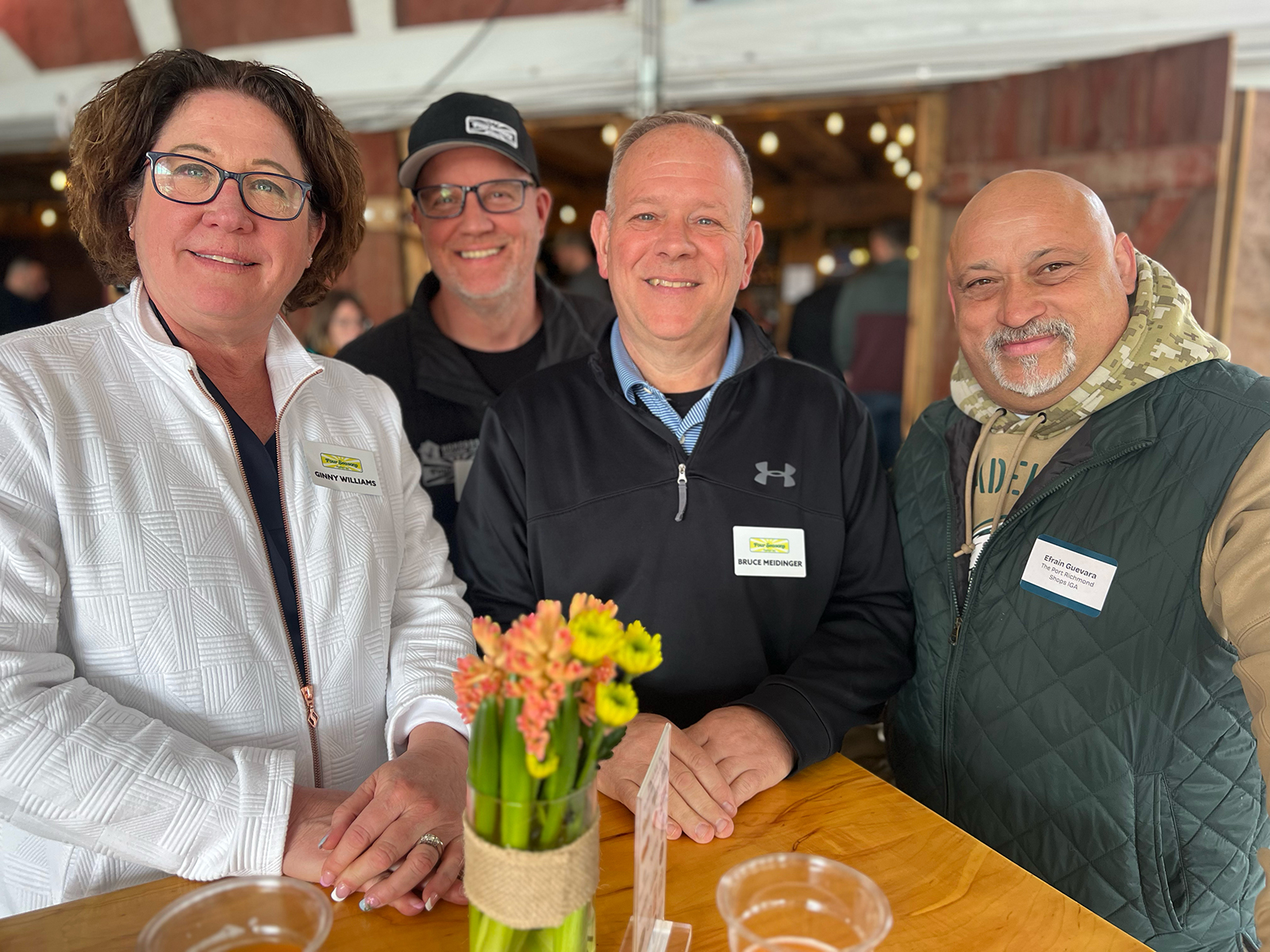 Ginny Williams, Brian Dey and Bruce Meidinger of Four Seasons with Efrain Guevara of The Port Richmond Shops IGA.