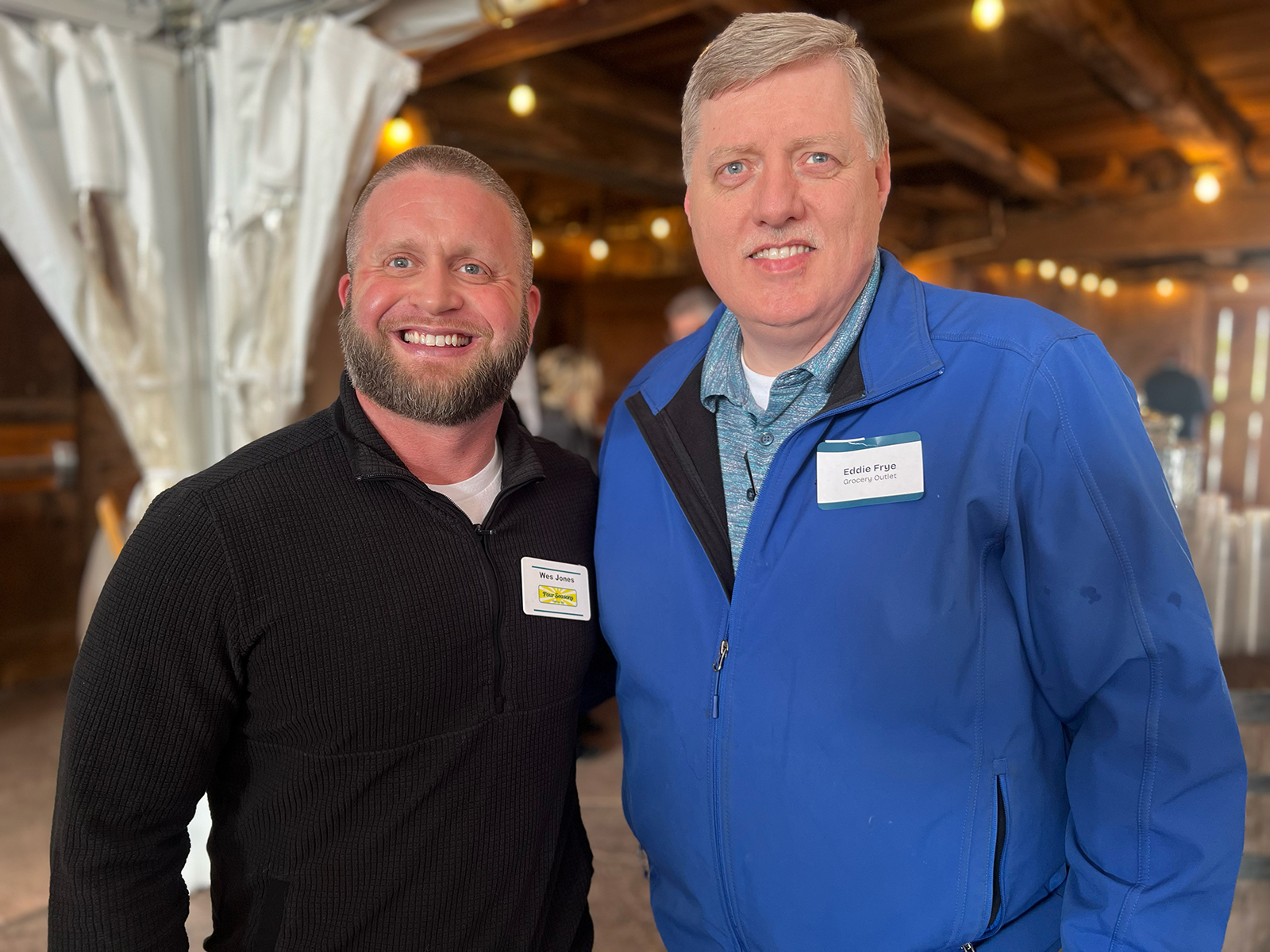 Wes Jones of Four Seasons with Eddy Frye of Grocery Outlet.