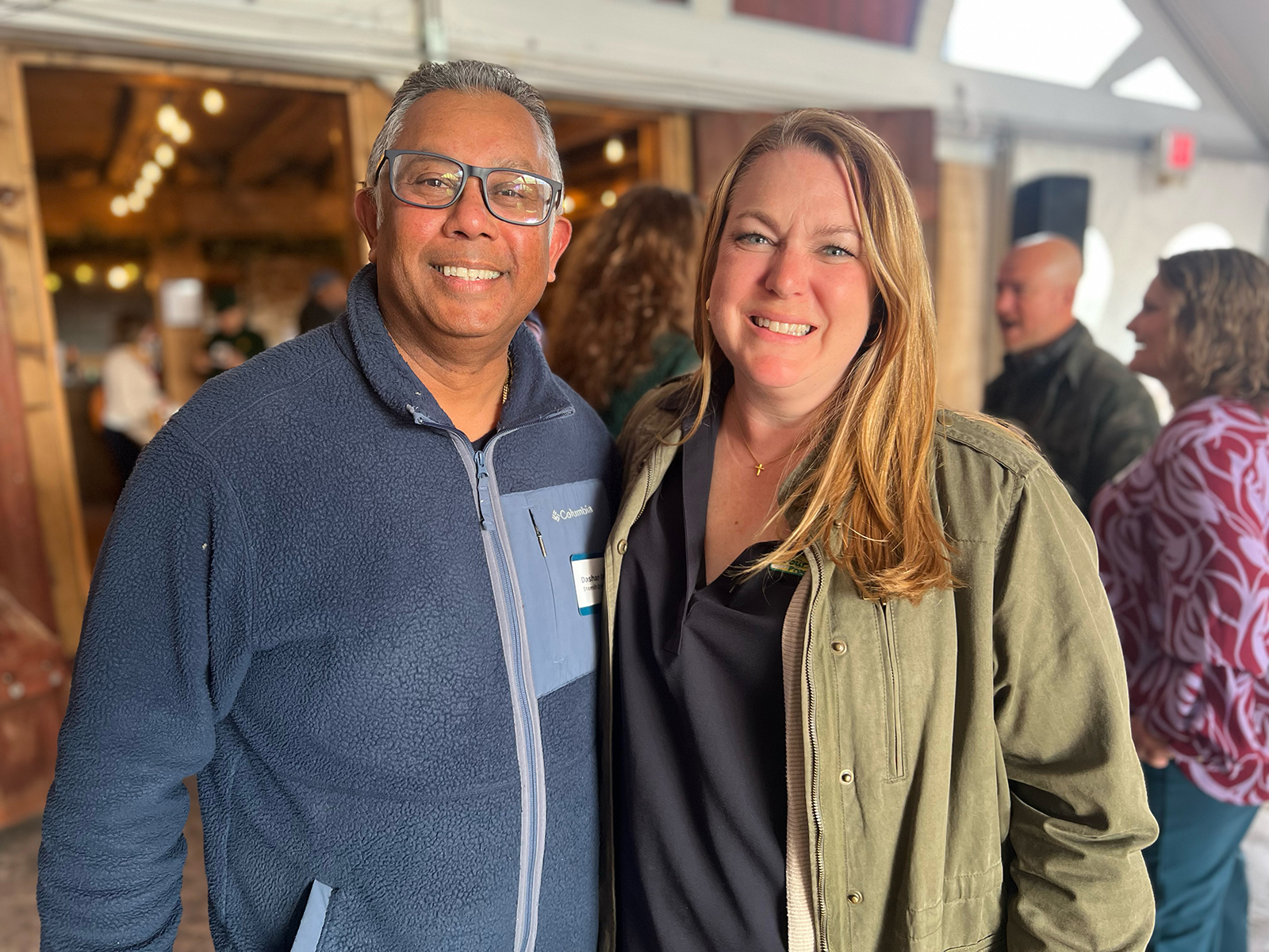 Dashan Dookhu of Stemilt and Traci Sensenig of Four Seasons.